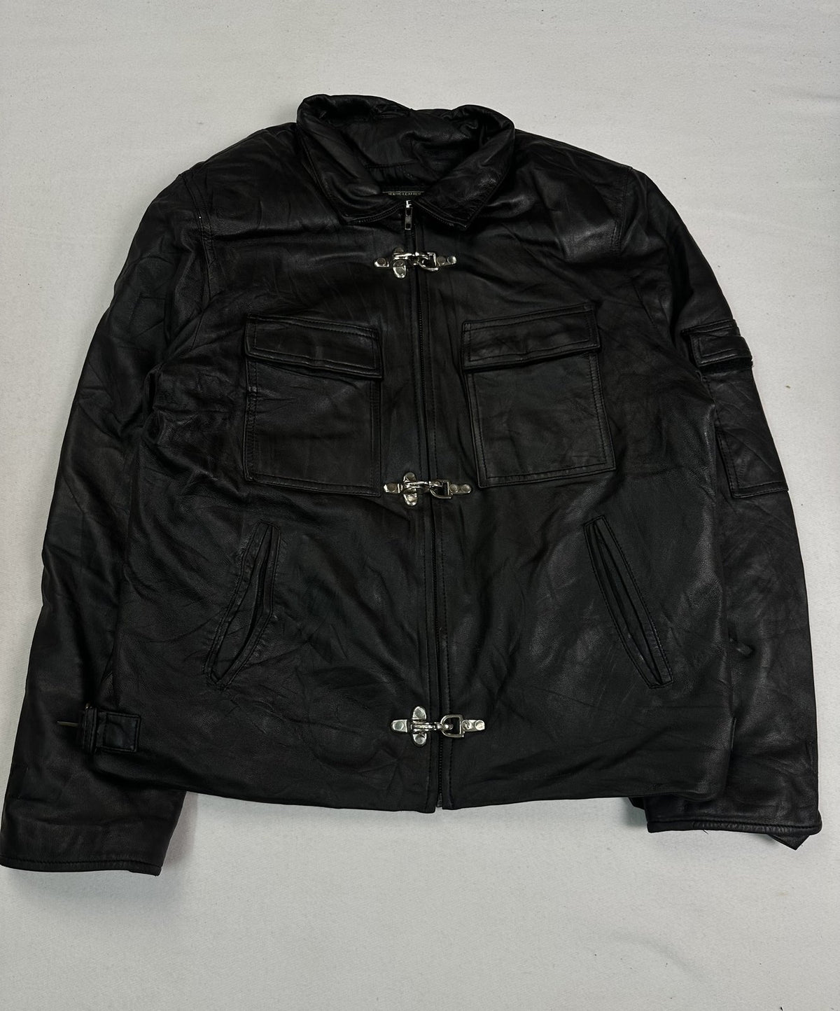 One of the five pockets set into the black leather field jacket