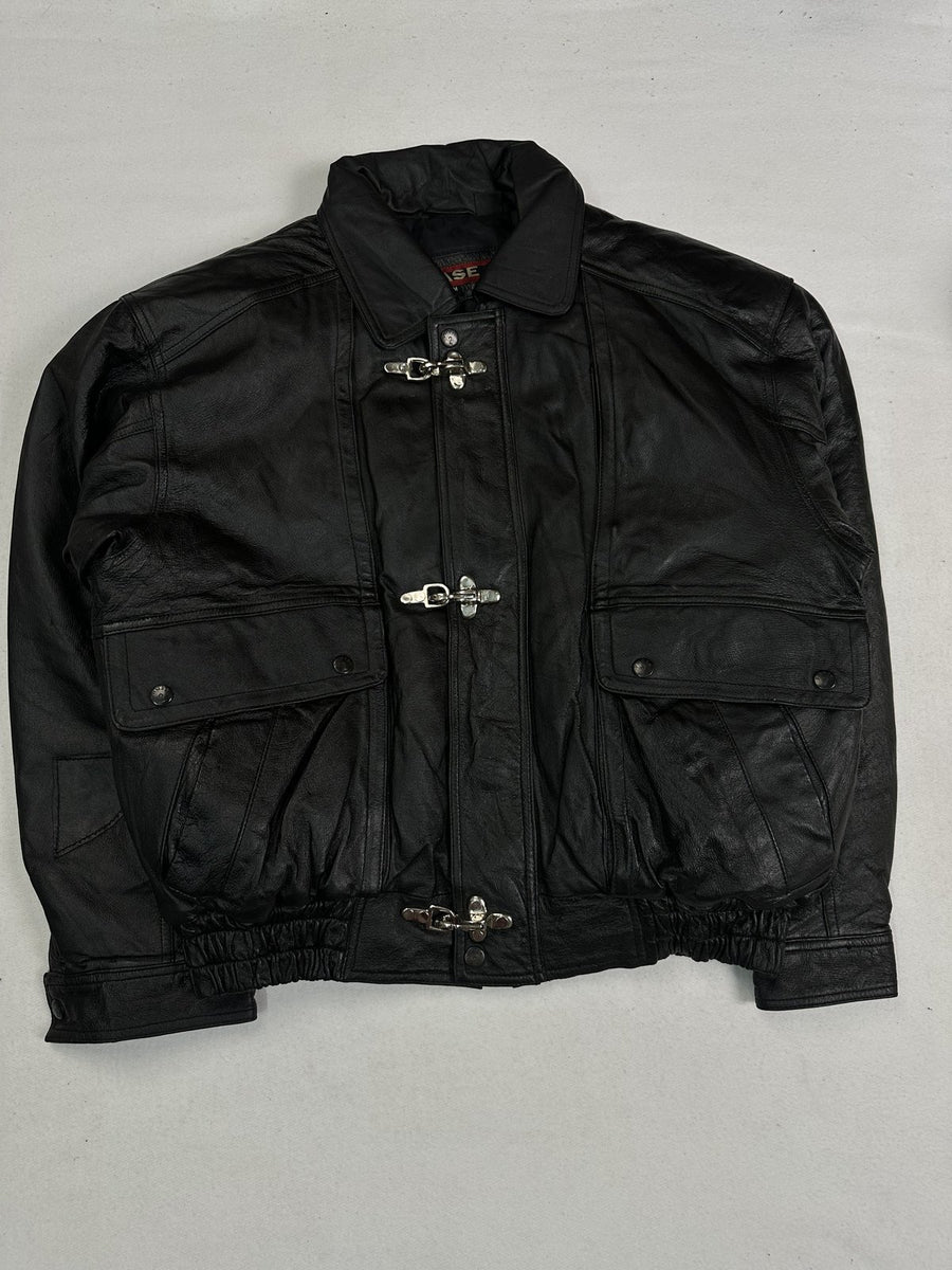 Black leather jacket in size XL with snap fastened flap chest pockets