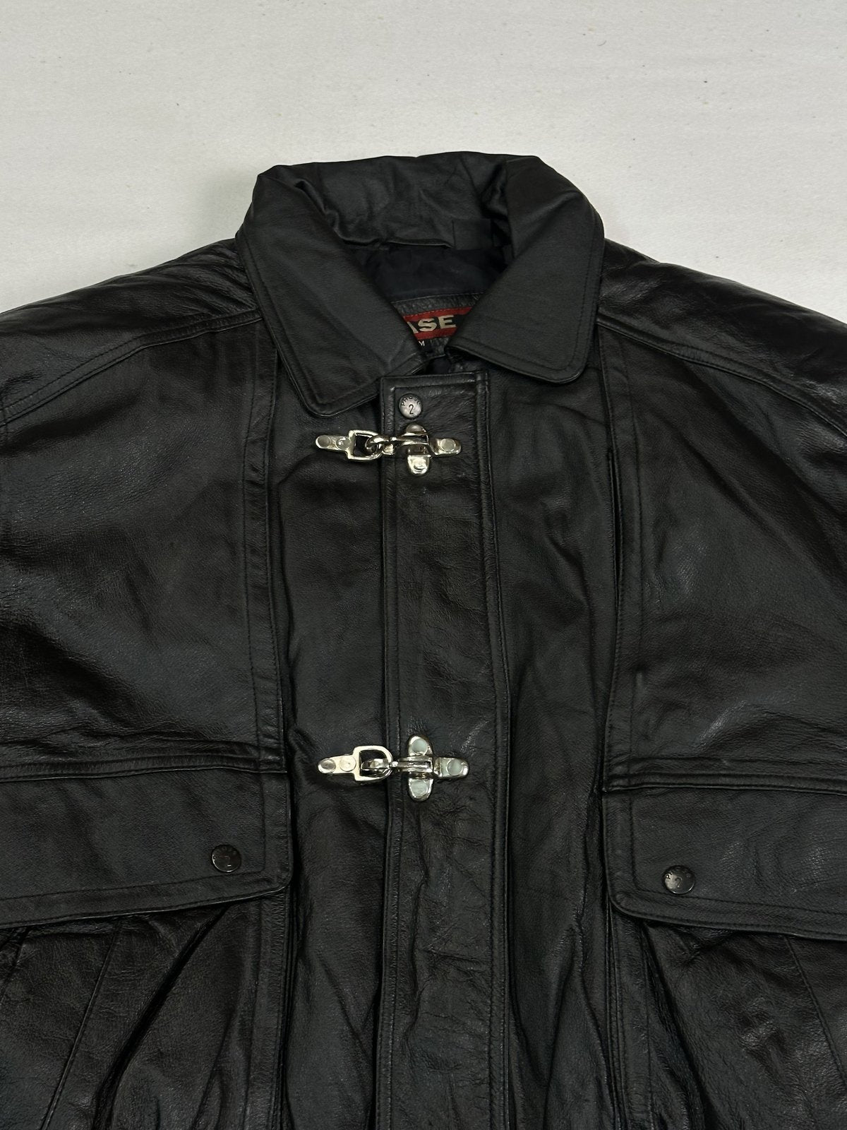 The size XL black jacket, 25 inches long through the body
