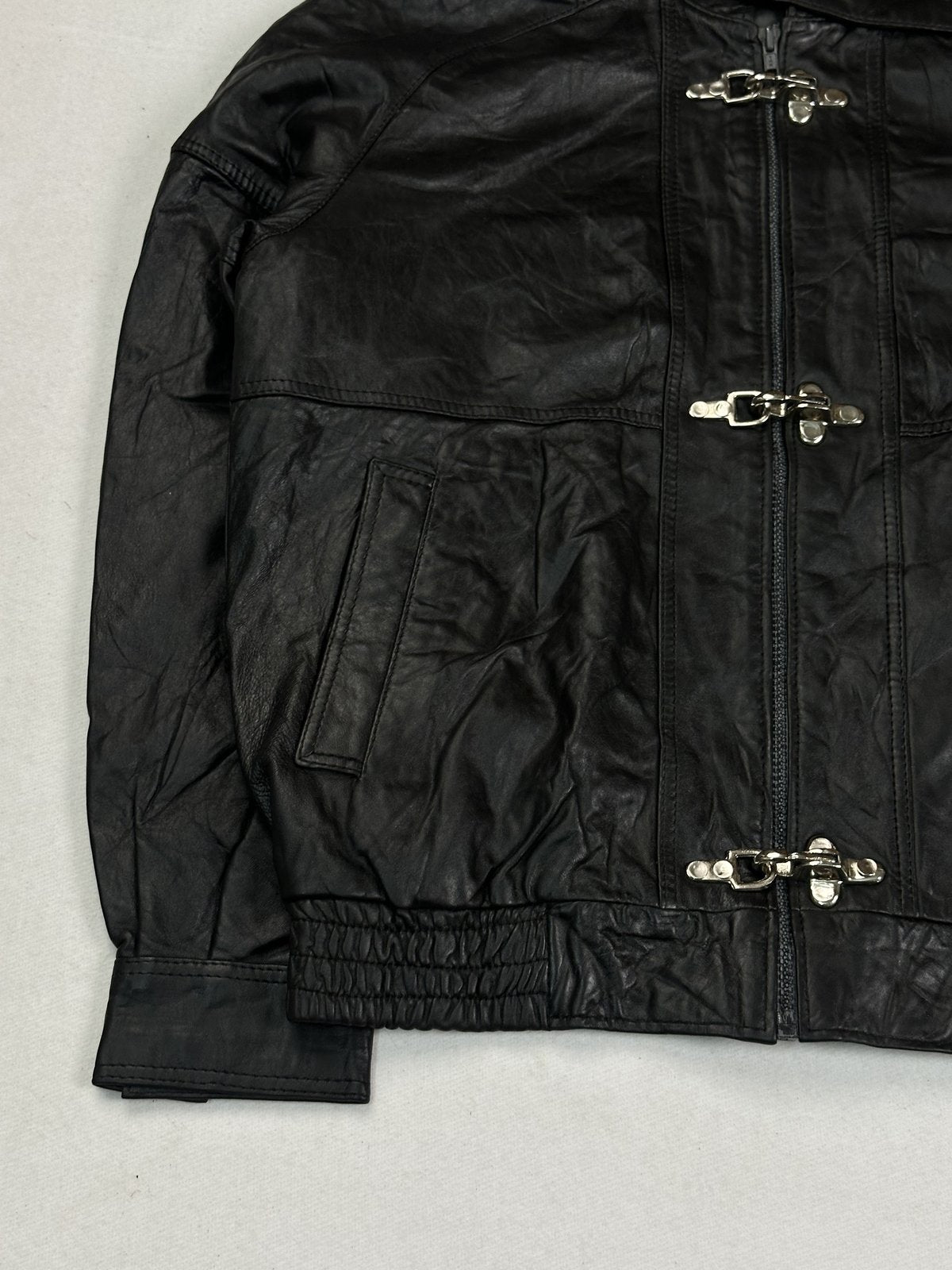 Size L jacket in black real leather with a 22 inch chest