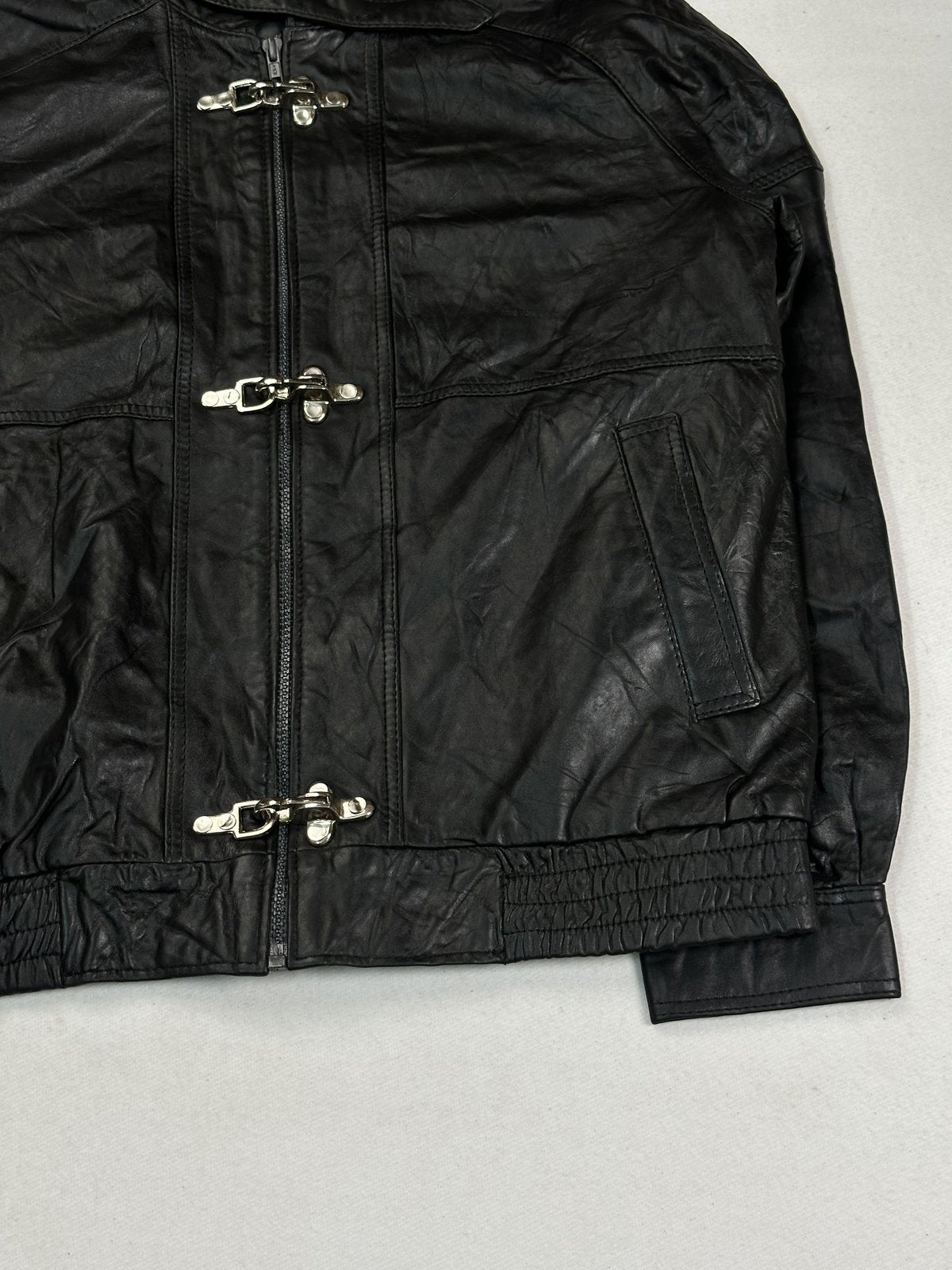Black leather jacket in very good condition, shown in size L