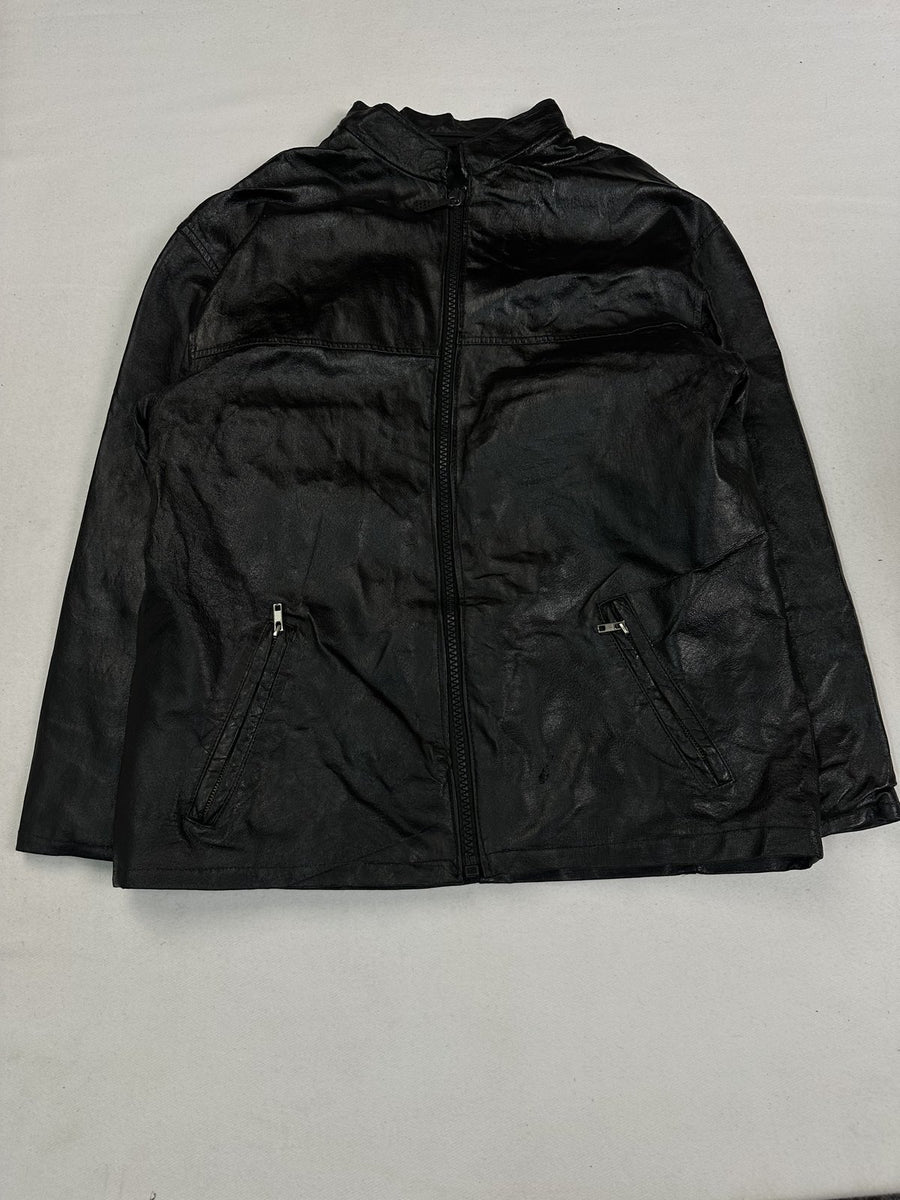 Black leather cafe racer jacket in size L with diagonal zip pockets