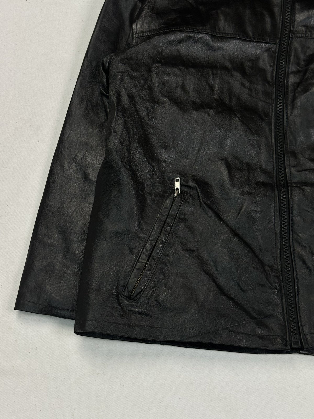 Black cafe racer jacket in very good condition, shown in size L