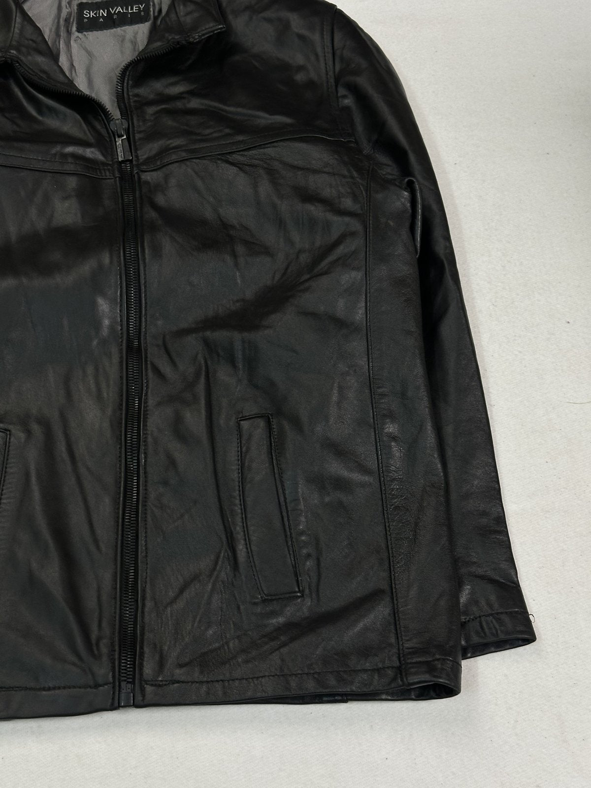Black cafe racer jacket in very good condition, shown in size L
