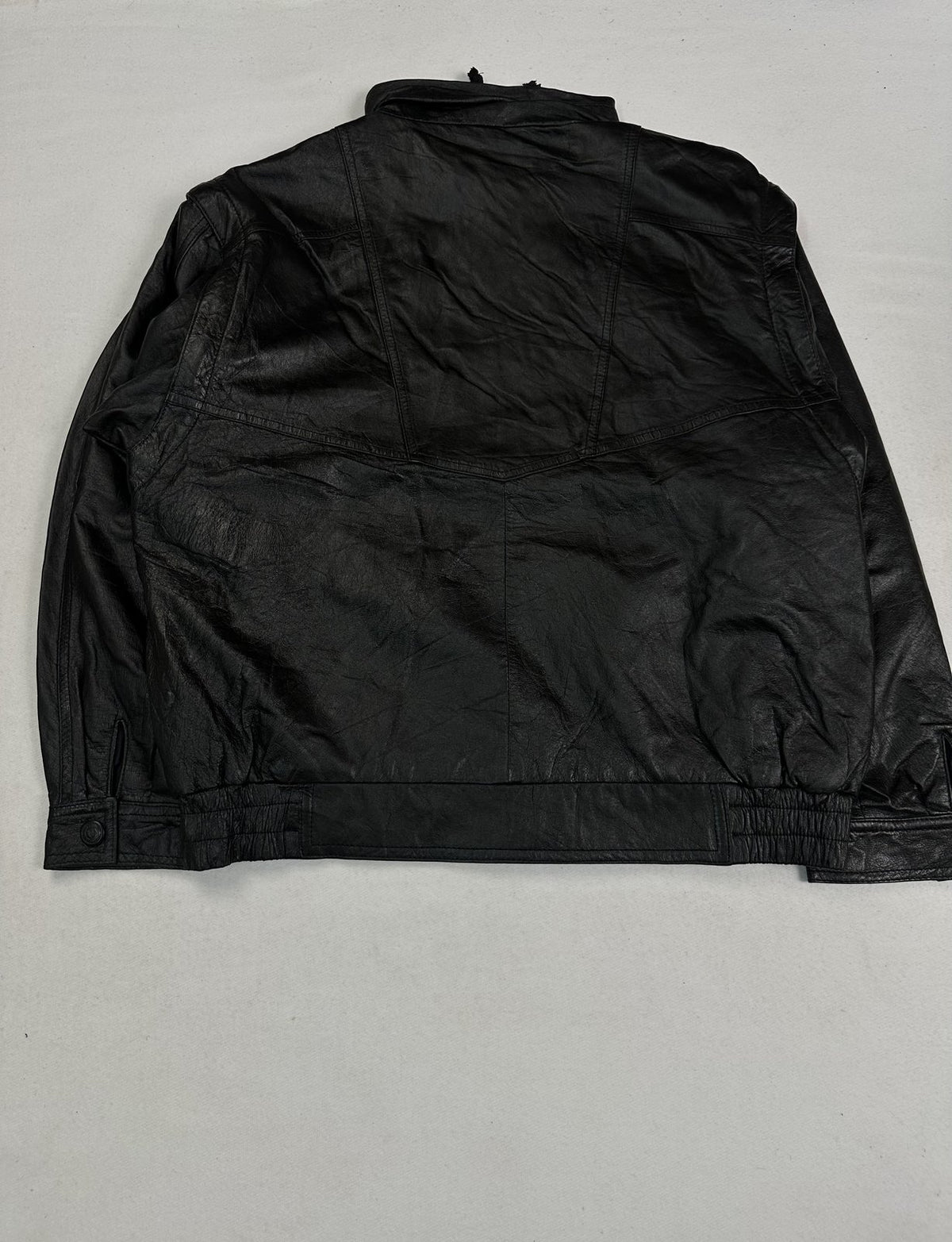 Flap pocket on the front of the black leather field jacket