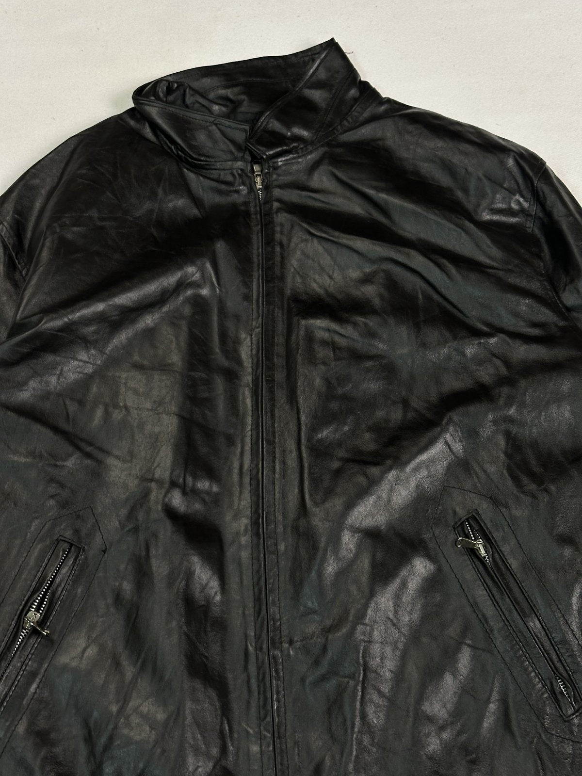 The size L black cafe racer, 26 inches long through the body