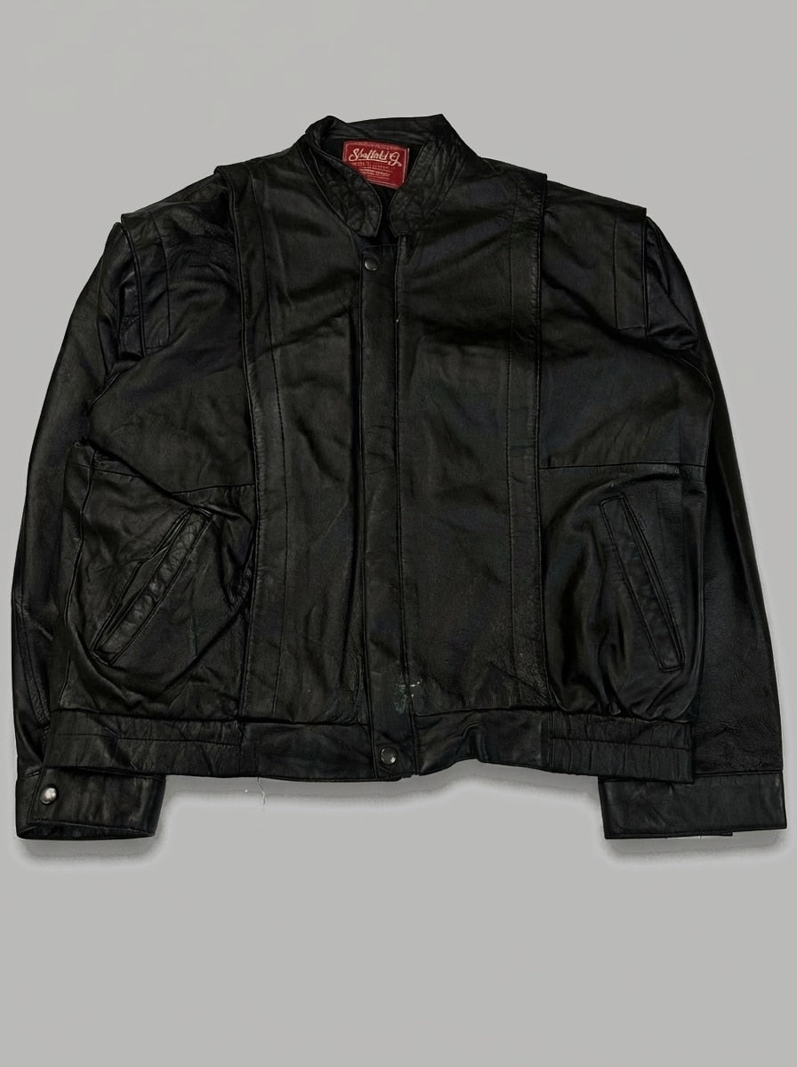 Black leather vintage jacket, size M, shown flat from the front. Snap Placket & Chest Yoke.