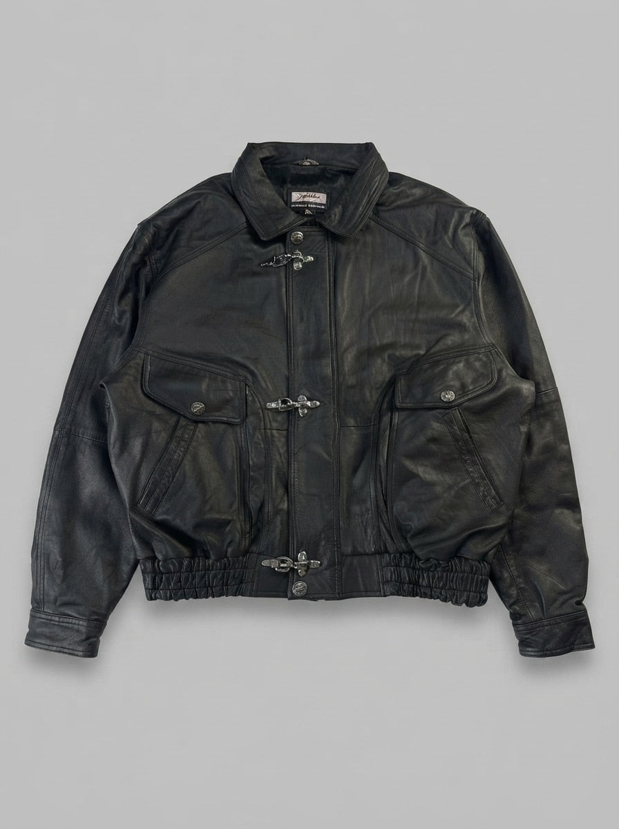 Black leather vintage jacket, size L, shown flat from the front. Three-Clasp Snap Chest Pockets.