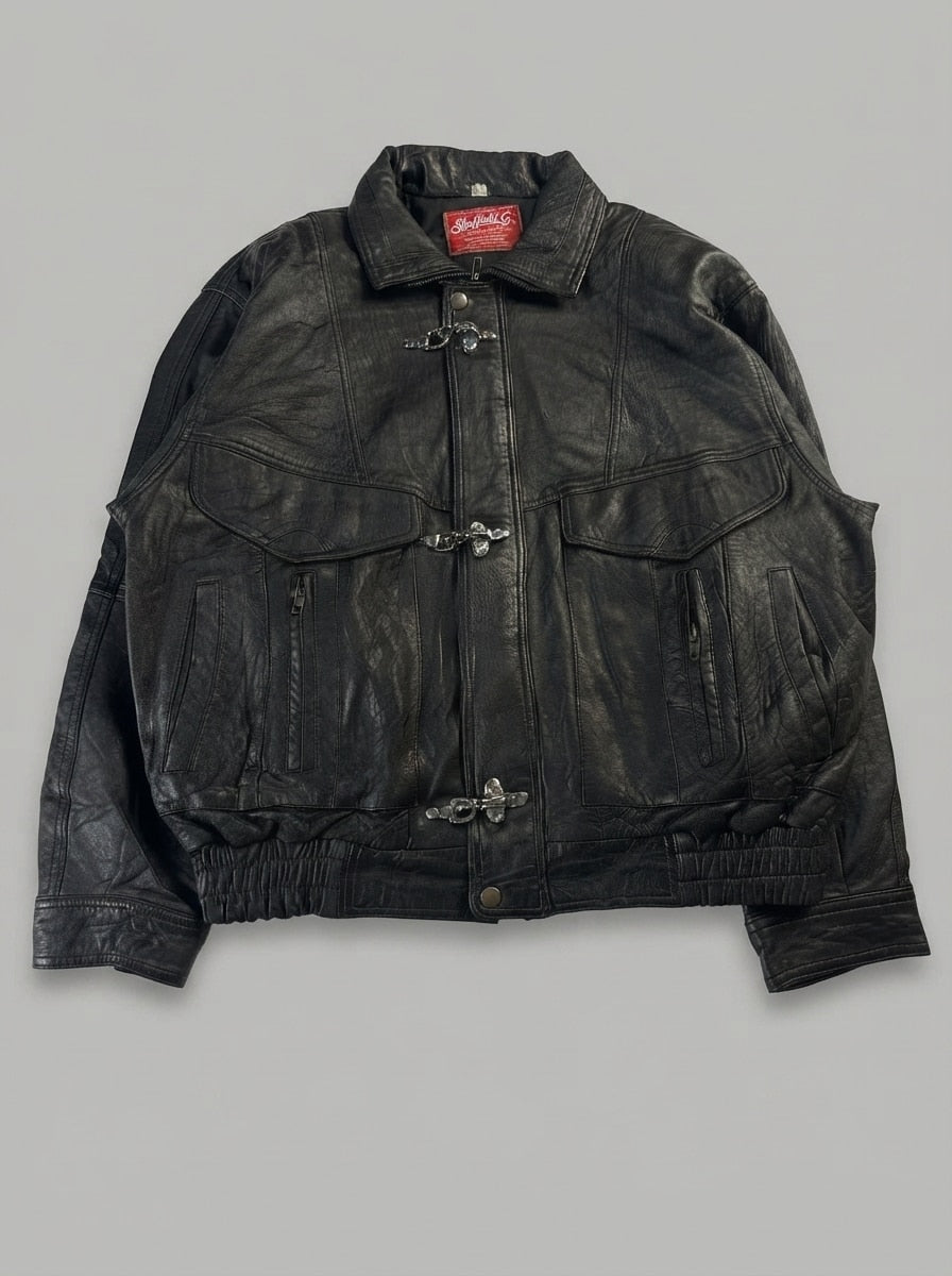 Black leather vintage jacket, size M, shown flat from the front. Three-Clasp Chest Yoke.