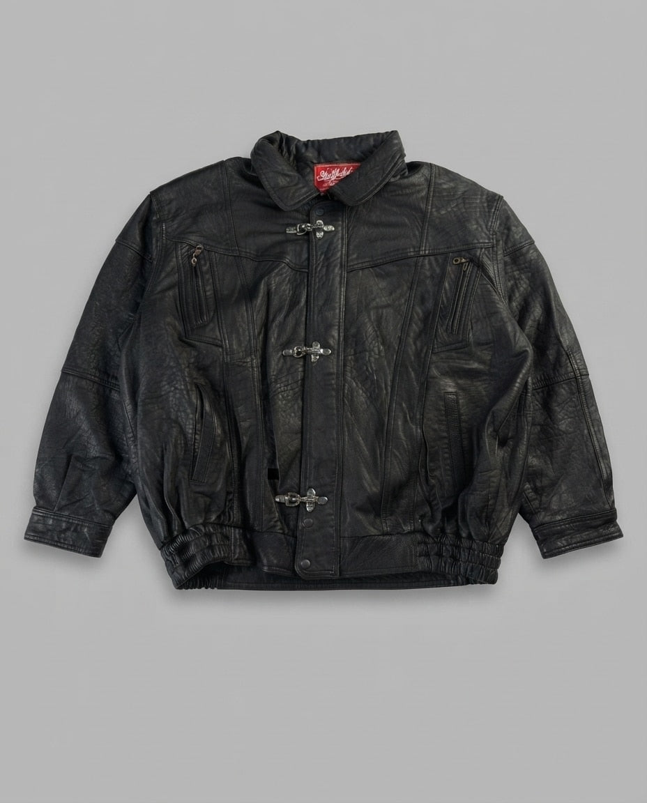 Black leather vintage jacket, size L, shown flat from the front. Three-Clasp Chest Zip Pockets.