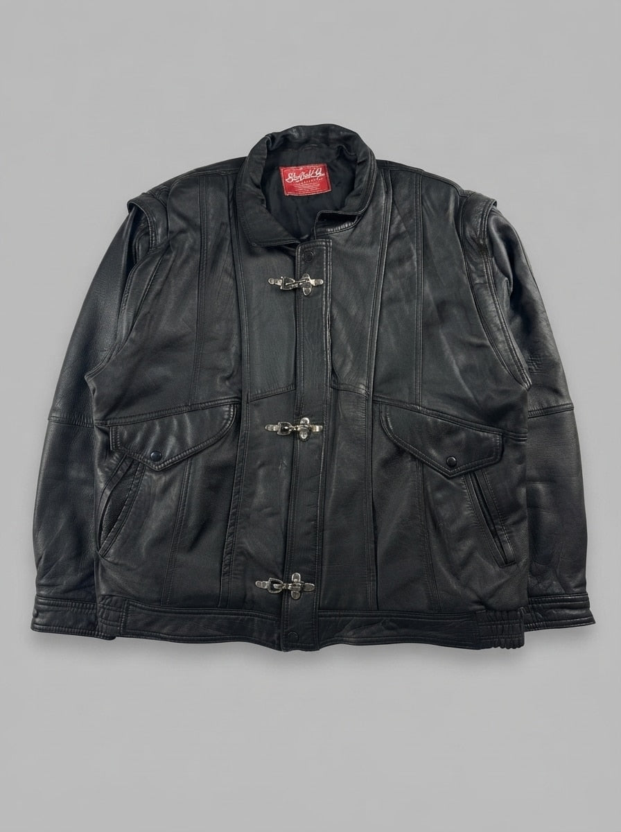 Black leather vintage jacket, size L, shown flat from the front. Chest Yoke & Three Clasps.