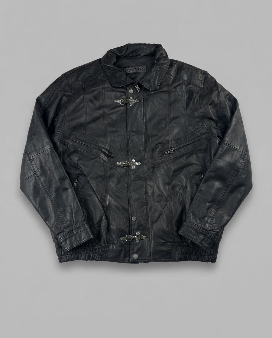 Black leather vintage jacket, size L, shown flat from the front. Chest Yoke & Three-Clasp Pocket.