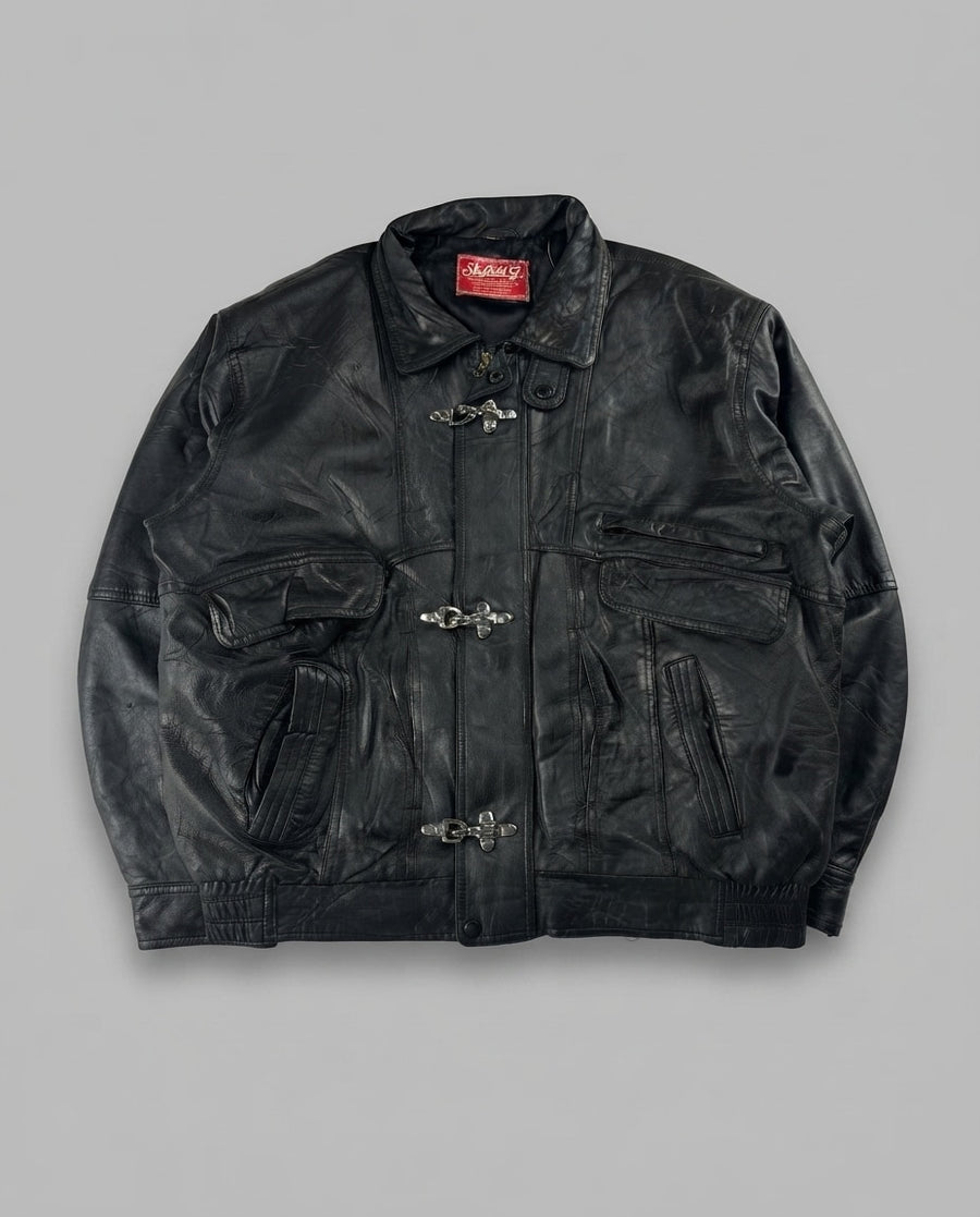 Black leather vintage jacket, size L, shown flat from the front. Three-Clasp Chest Zip & Flap.