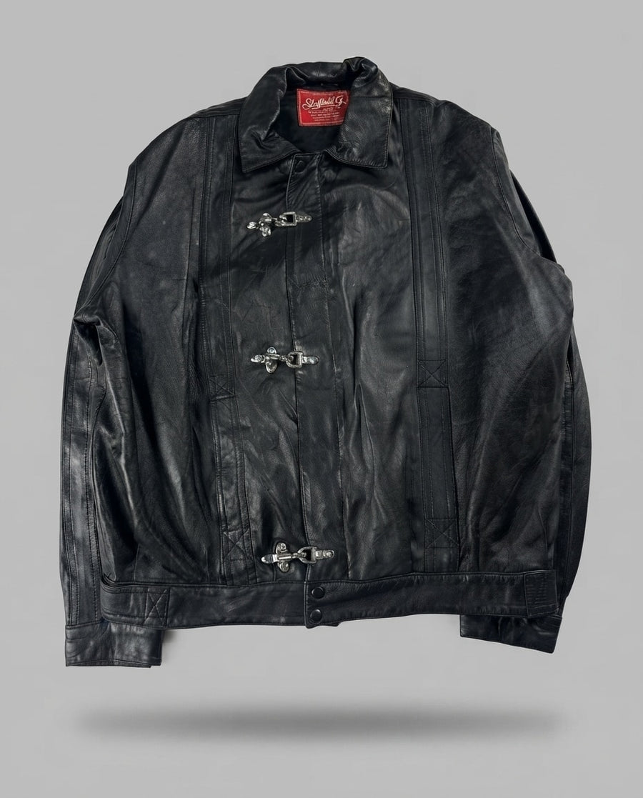 Black leather vintage jacket, size L, shown flat from the front. Chest Yoke & Three Clasps.