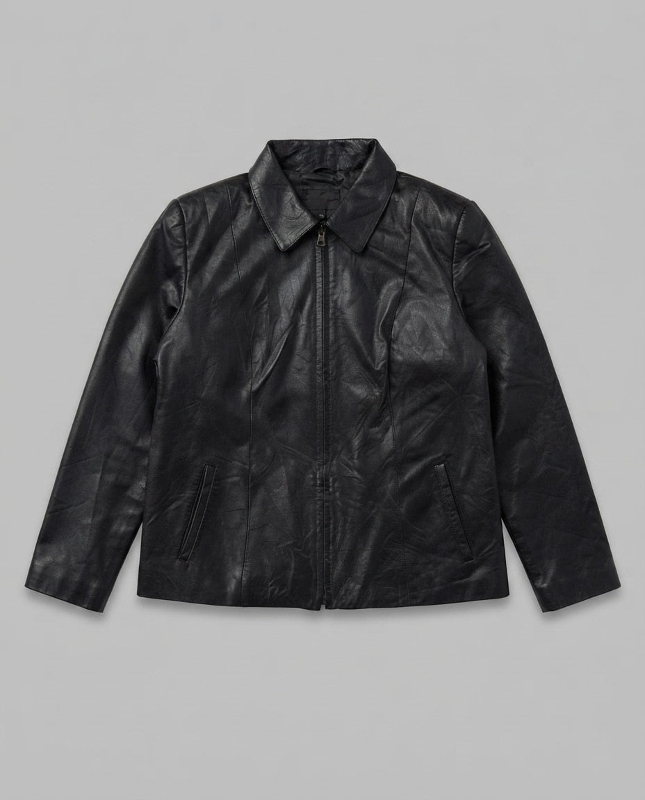 Black leather vintage jacket, size XS, shown flat from the front. Shirt Collar & Slash Pockets.