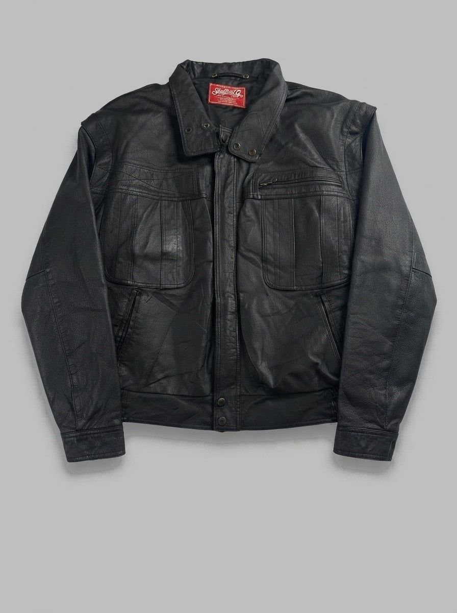 Black leather vintage jacket, size M, shown flat from the front. Flap & Zip Chest Pockets.
