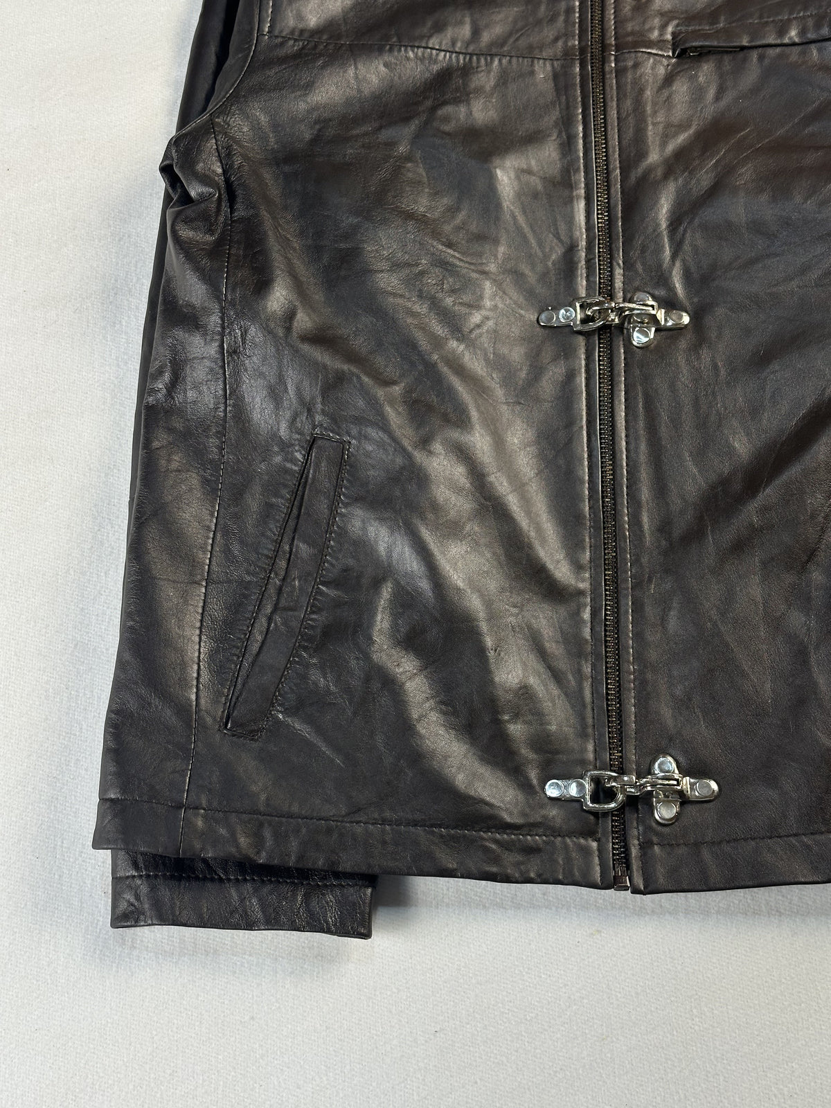 Size L jacket in brown real leather with a 22 inch chest
