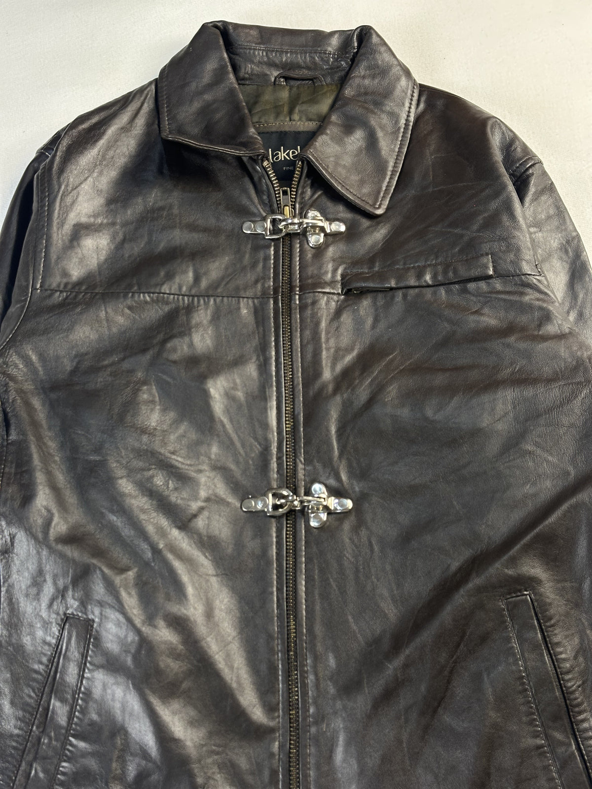 The size L brown jacket, 26 inches long through the body