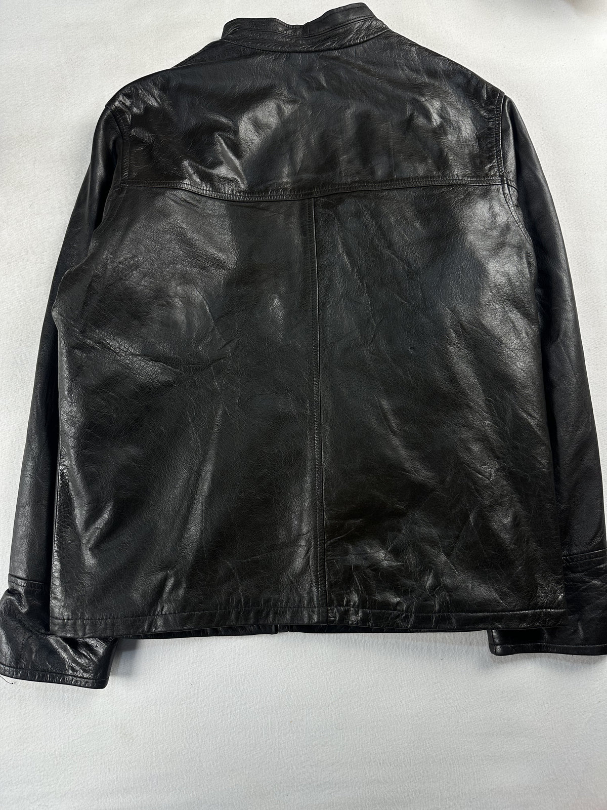 Quilted lining inside the brown leather cafe racer