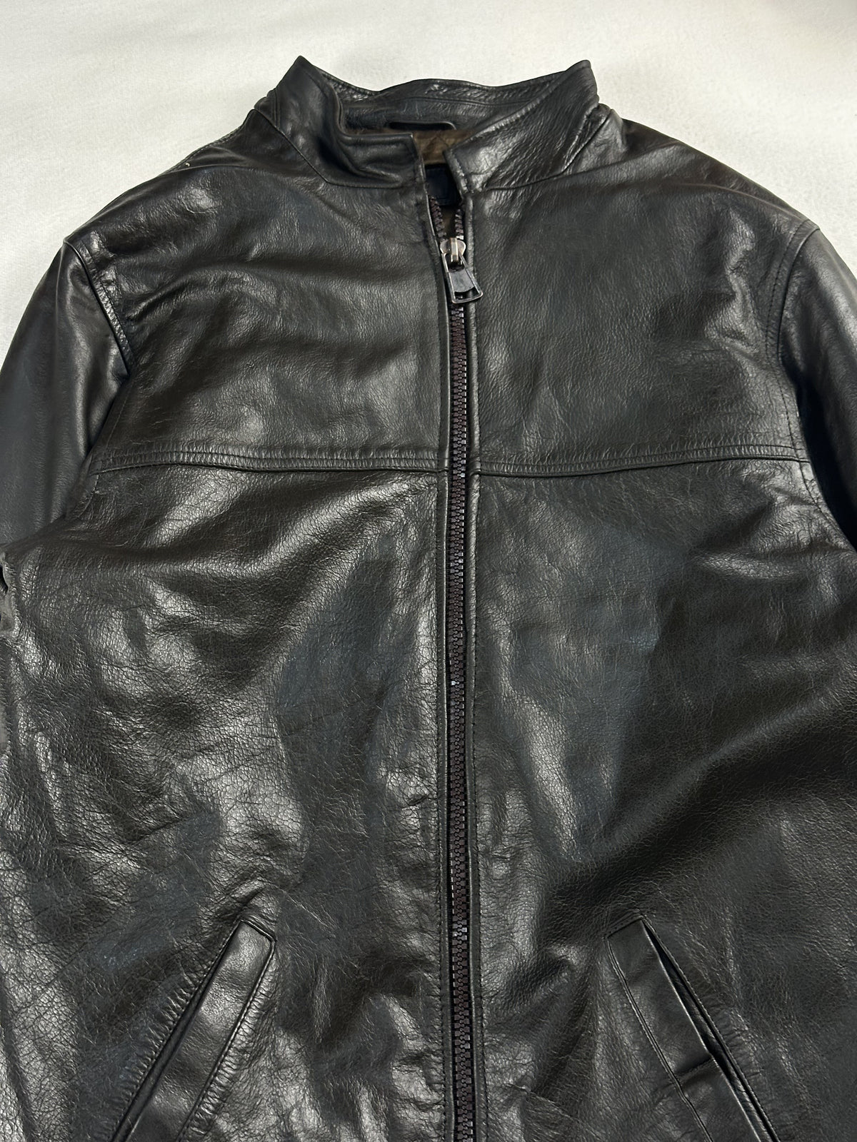 The size L brown cafe racer, 27 inches long through the body