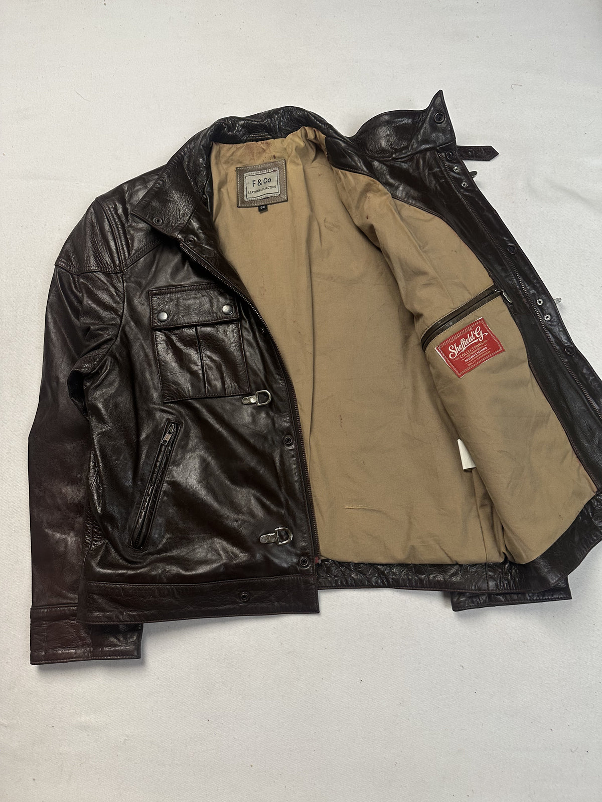 Brown real leather field jacket with a short 21 inch sleeve, size L