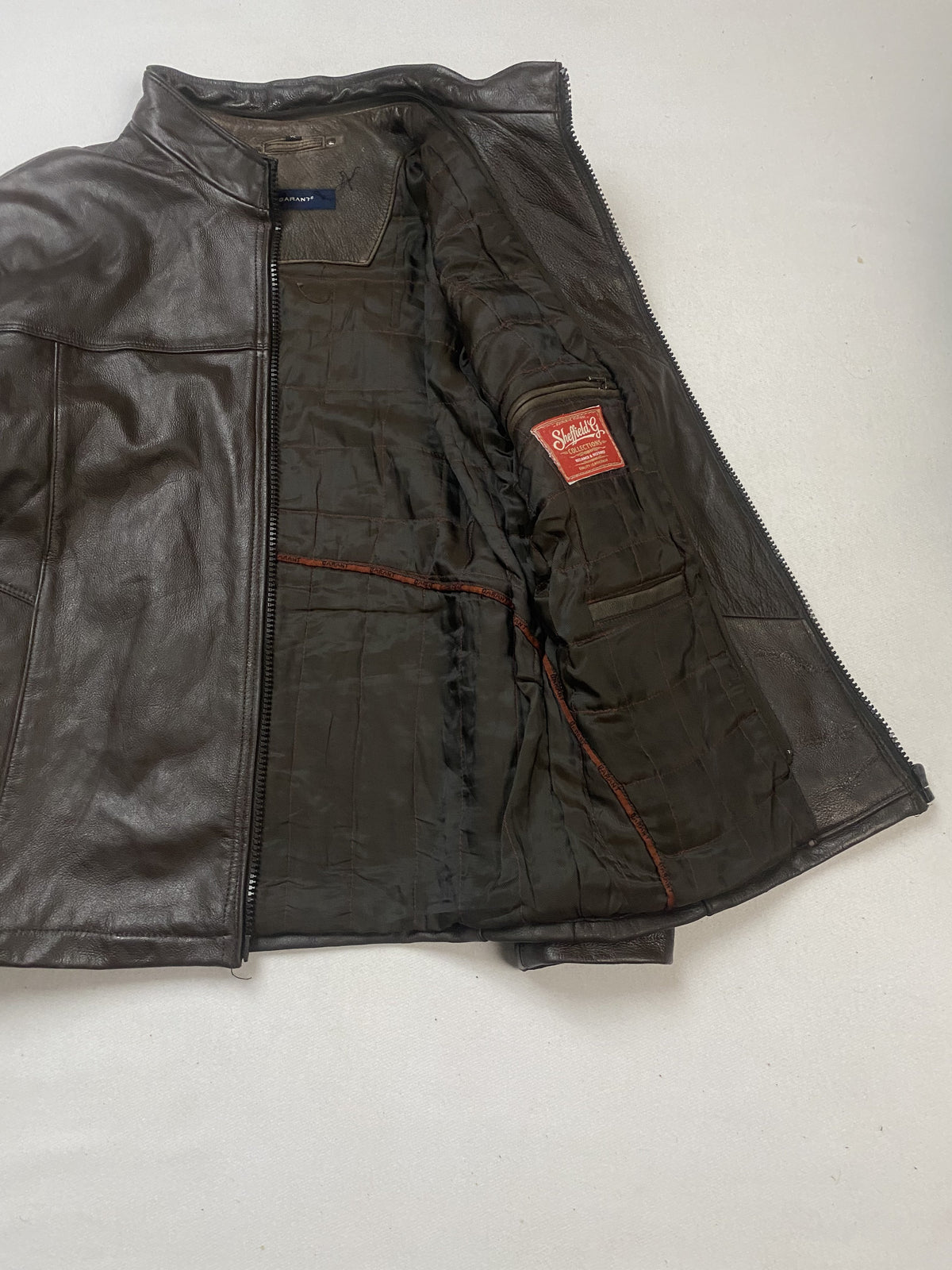 Size L cafe racer in brown real leather with a 22 inch chest