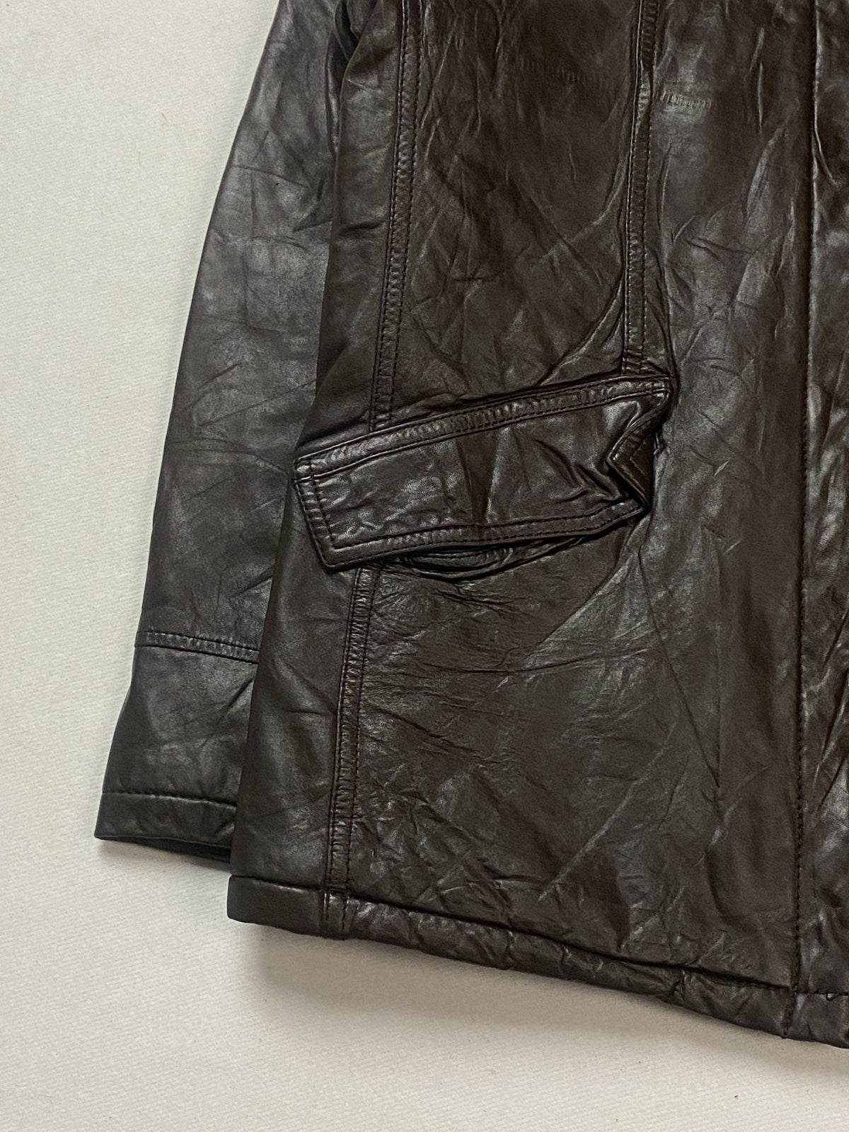 Size L jacket in brown real leather with a 23 inch chest