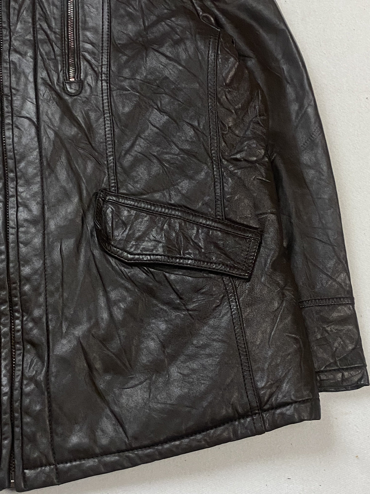 Brown leather jacket in very good condition, shown in size L