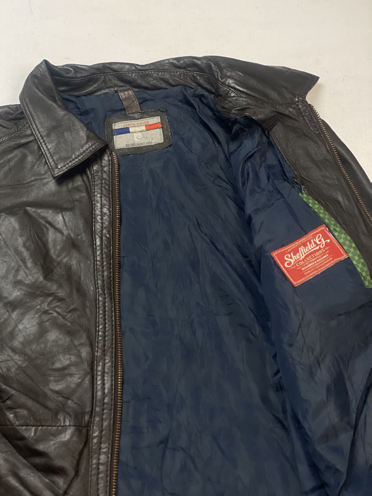 Broad shouldered brown leather harrington in size XXL, 24 inches across