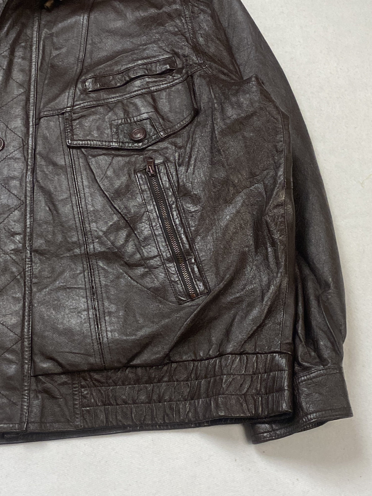 Brown leather trucker jacket in very good condition, shown in size XL