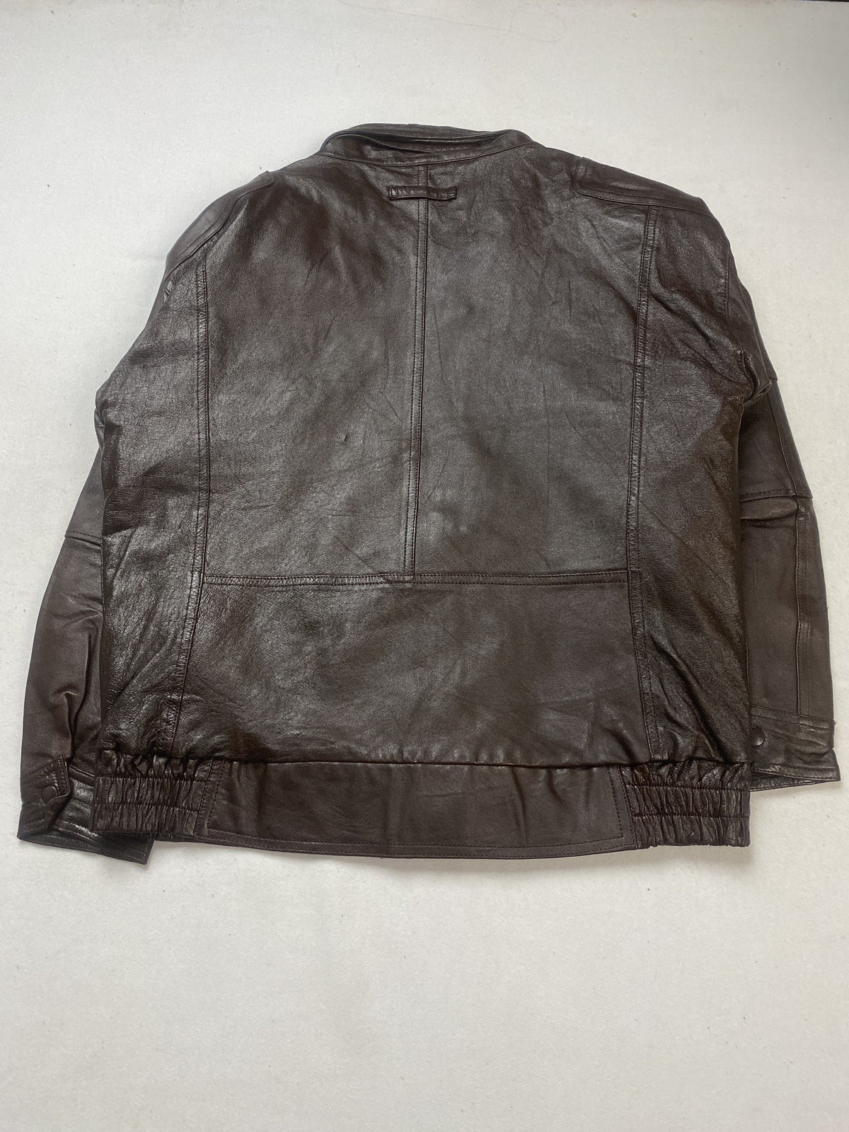 Pinstripe lining inside the brown leather jacket