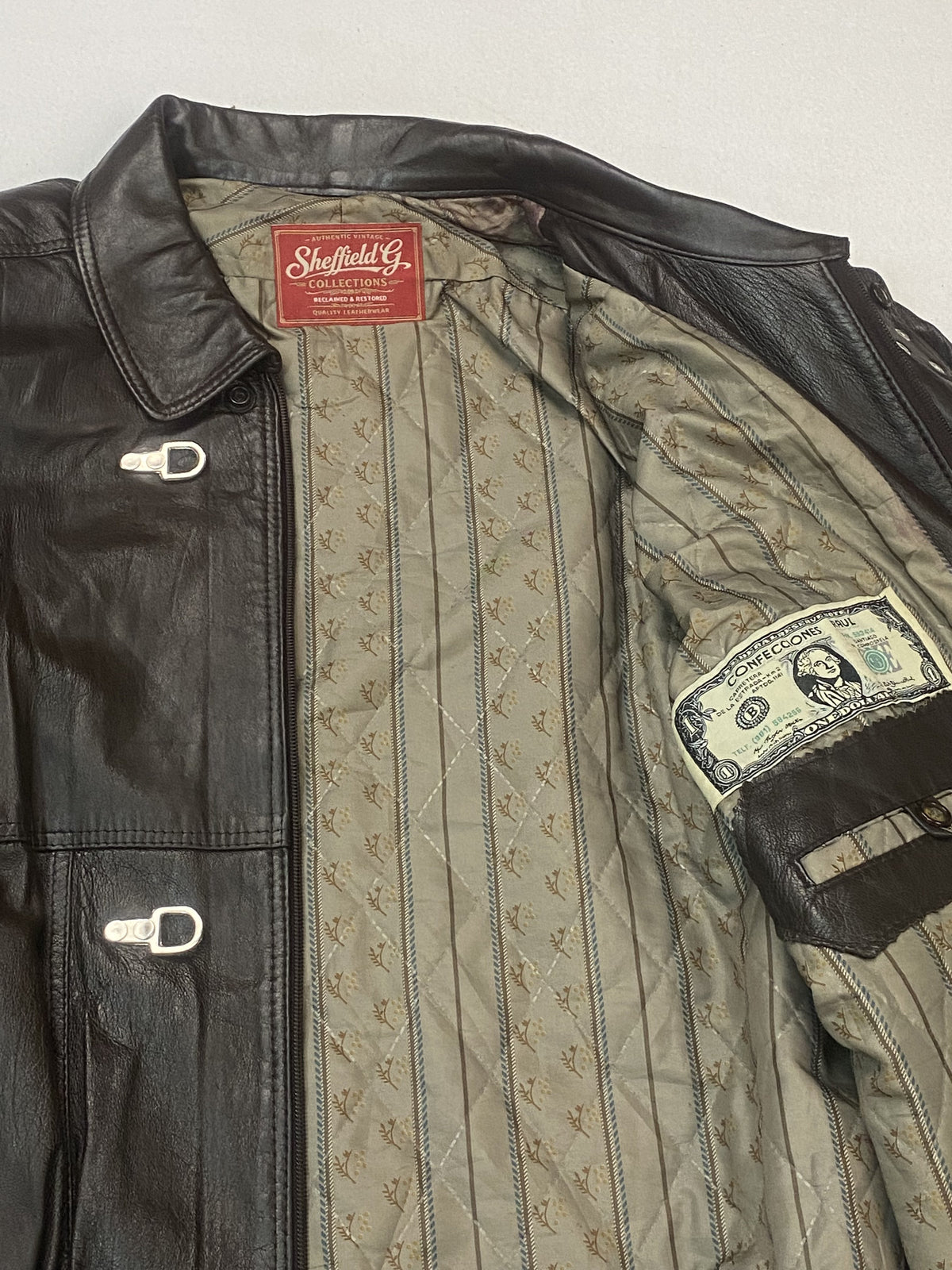 Brown real leather harrington with a 23 inch sleeve, size XXL