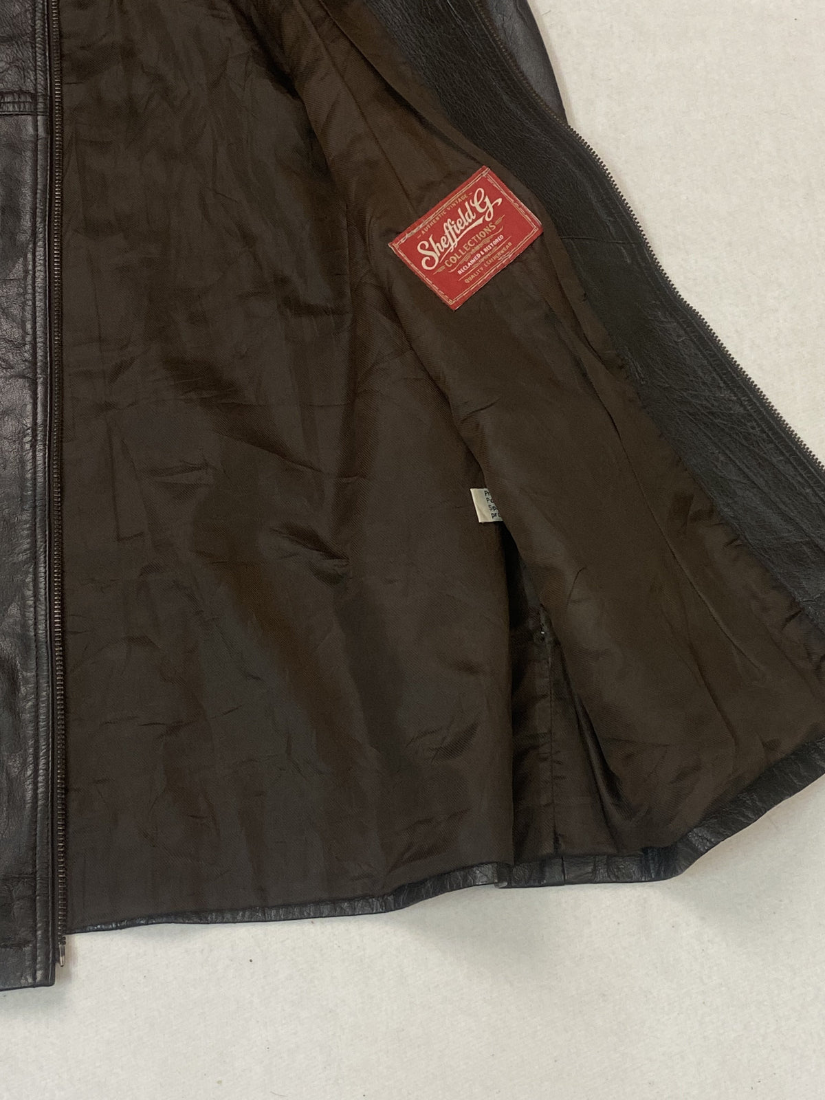 Brown real leather cafe racer with a 25 inch sleeve, size L