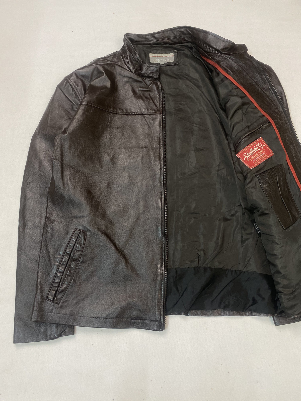 Slim shouldered brown leather cafe racer jacket in size L