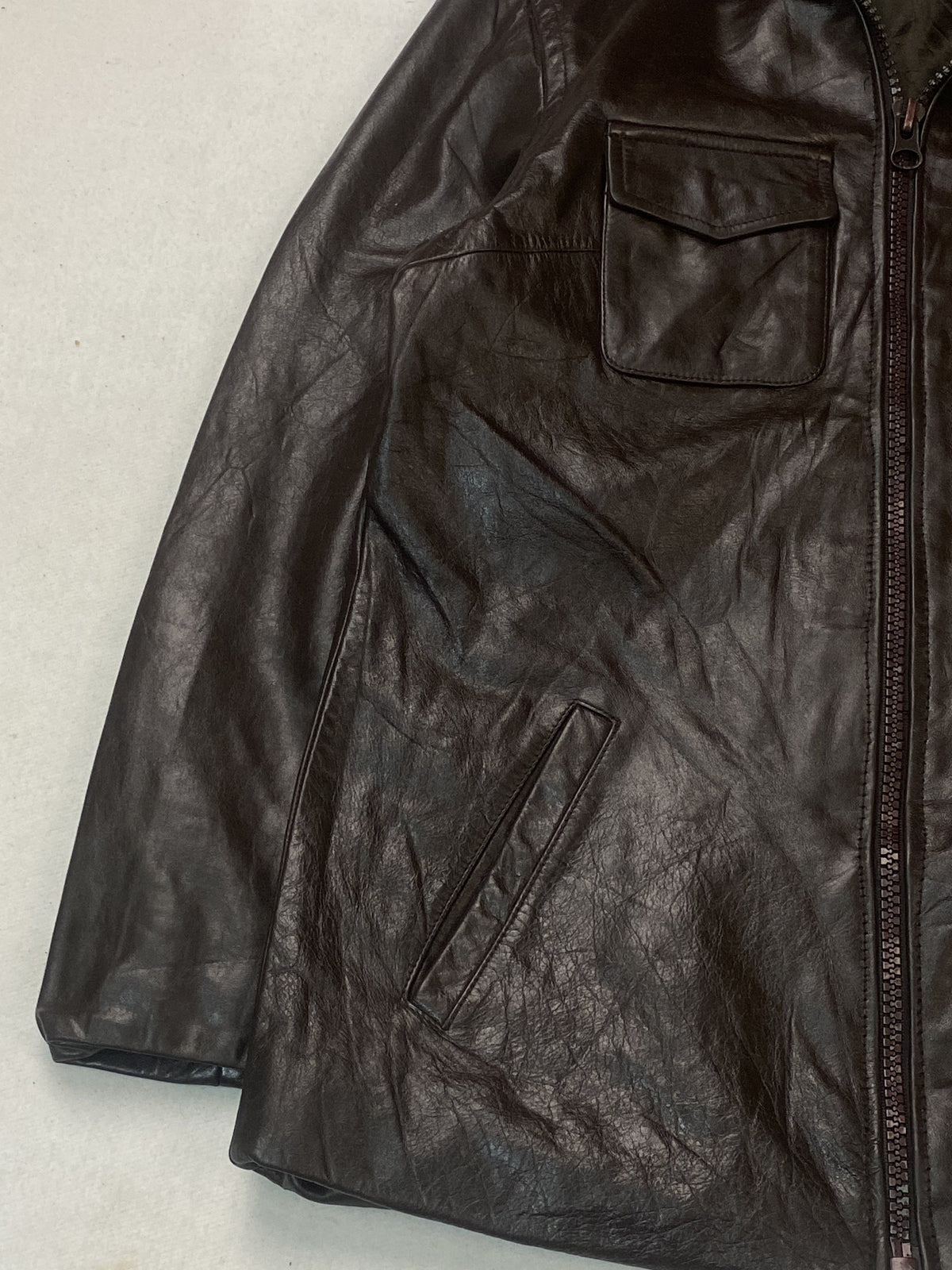 Size XL trucker in brown real leather with a 24 inch chest