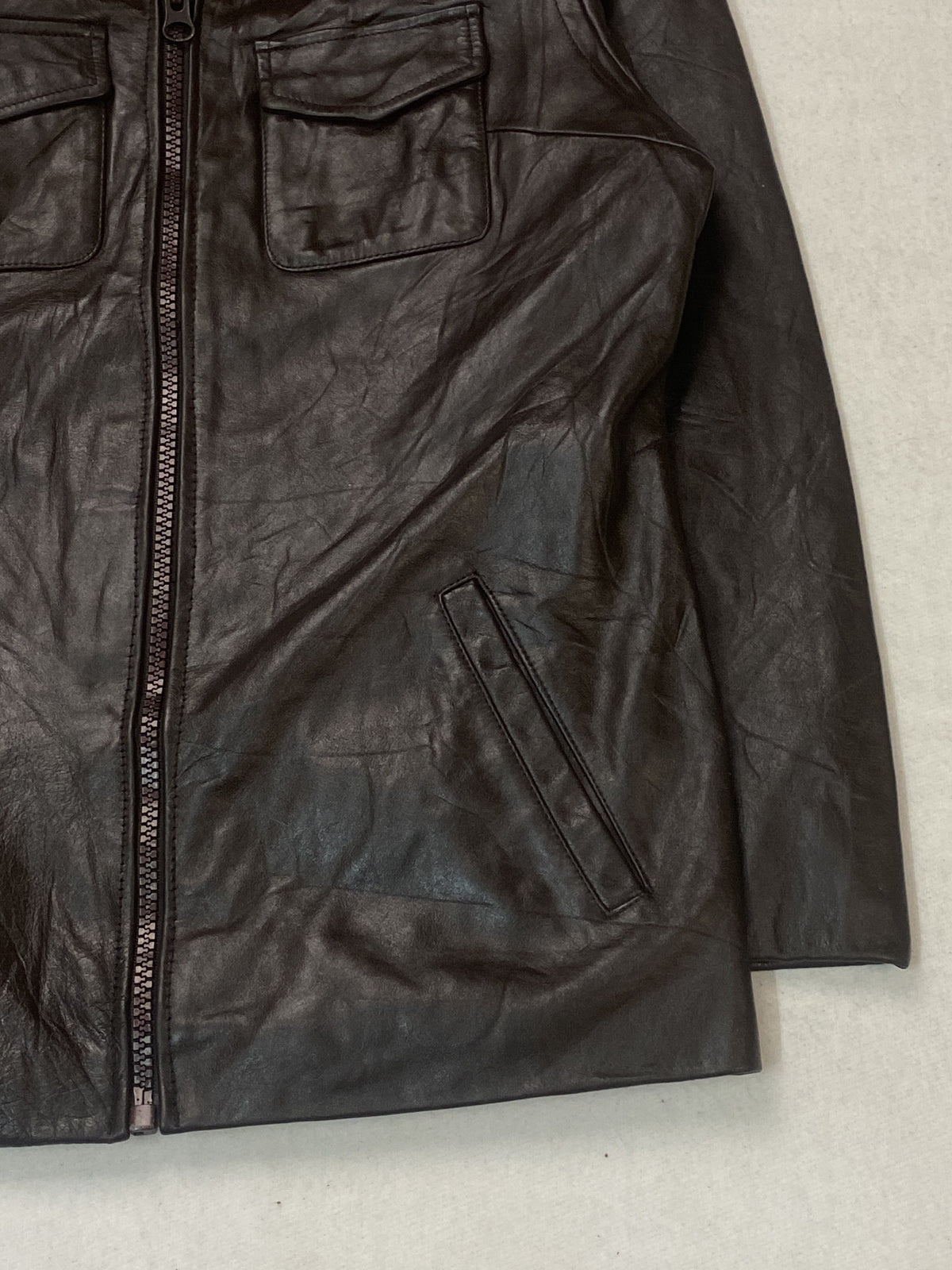 Brown leather trucker jacket in very good condition, shown in size XL