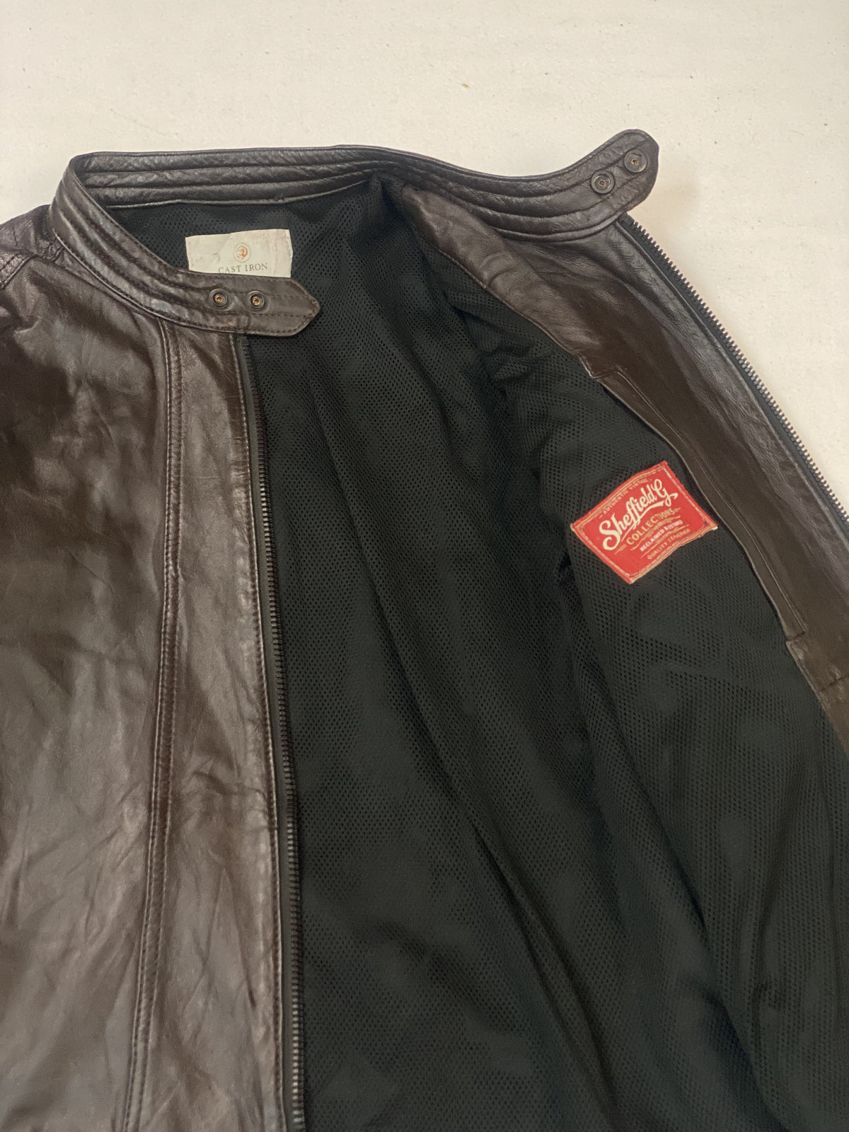Brown real leather cafe racer with a 23 inch sleeve, size M