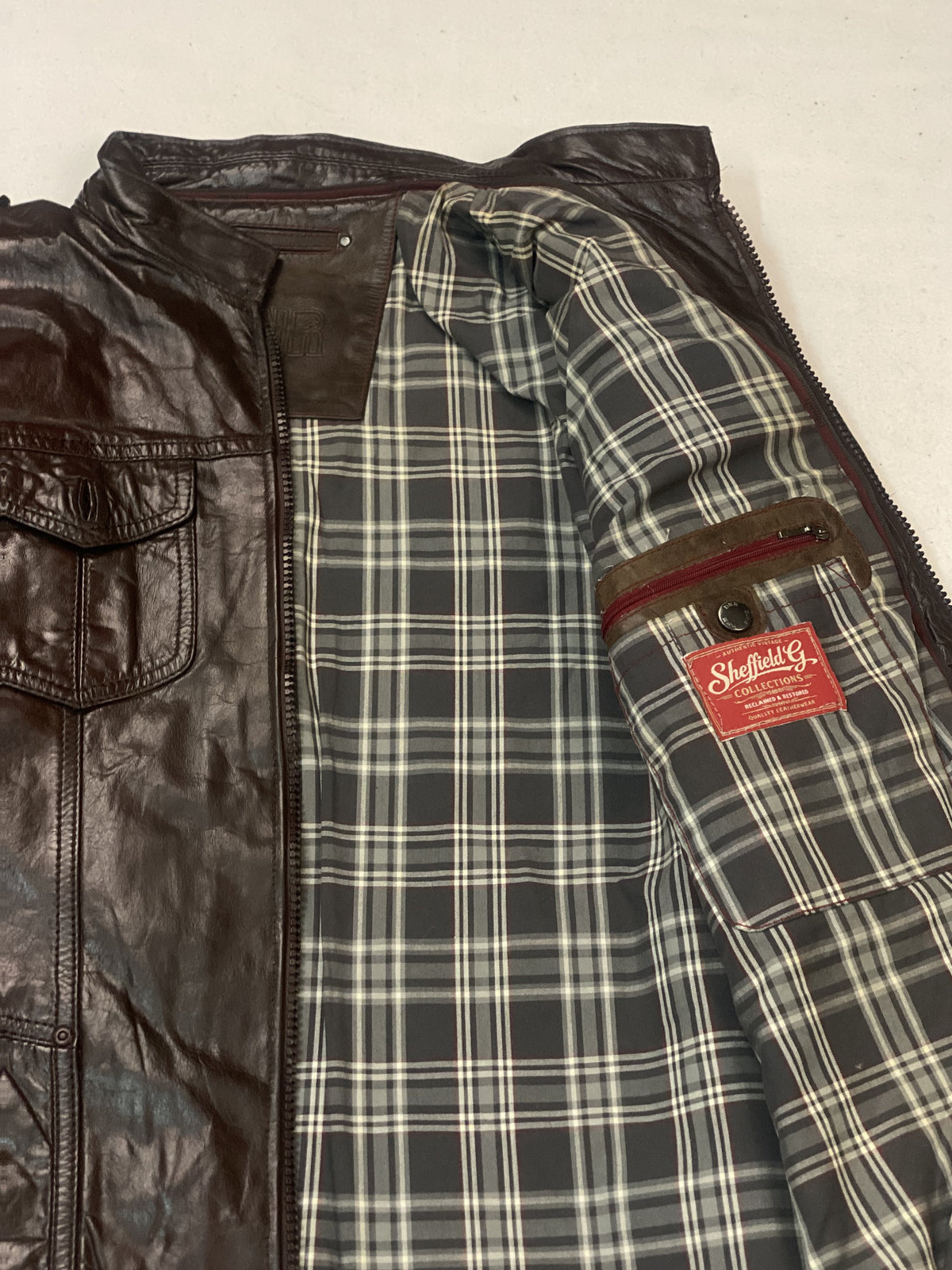 The long size L brown trucker, 29 inches through the body