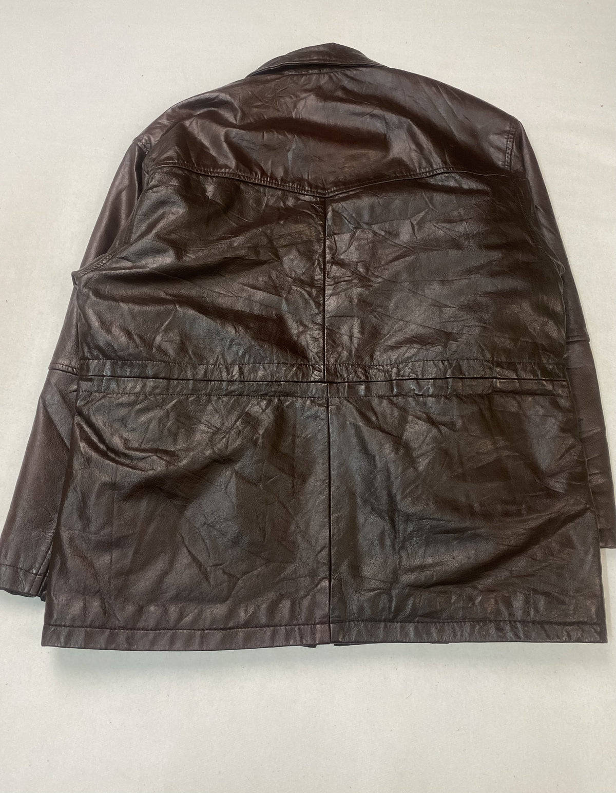 Mid length brown cafe racer in real leather, 29 inches through the body