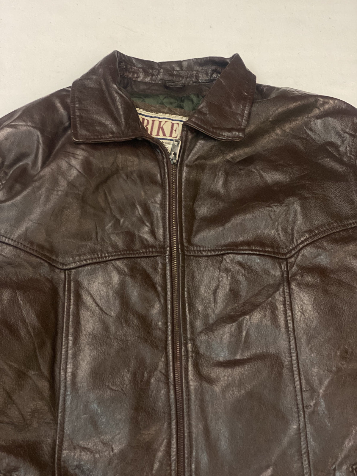 Brown real leather cafe racer with a short 20 inch sleeve, size L