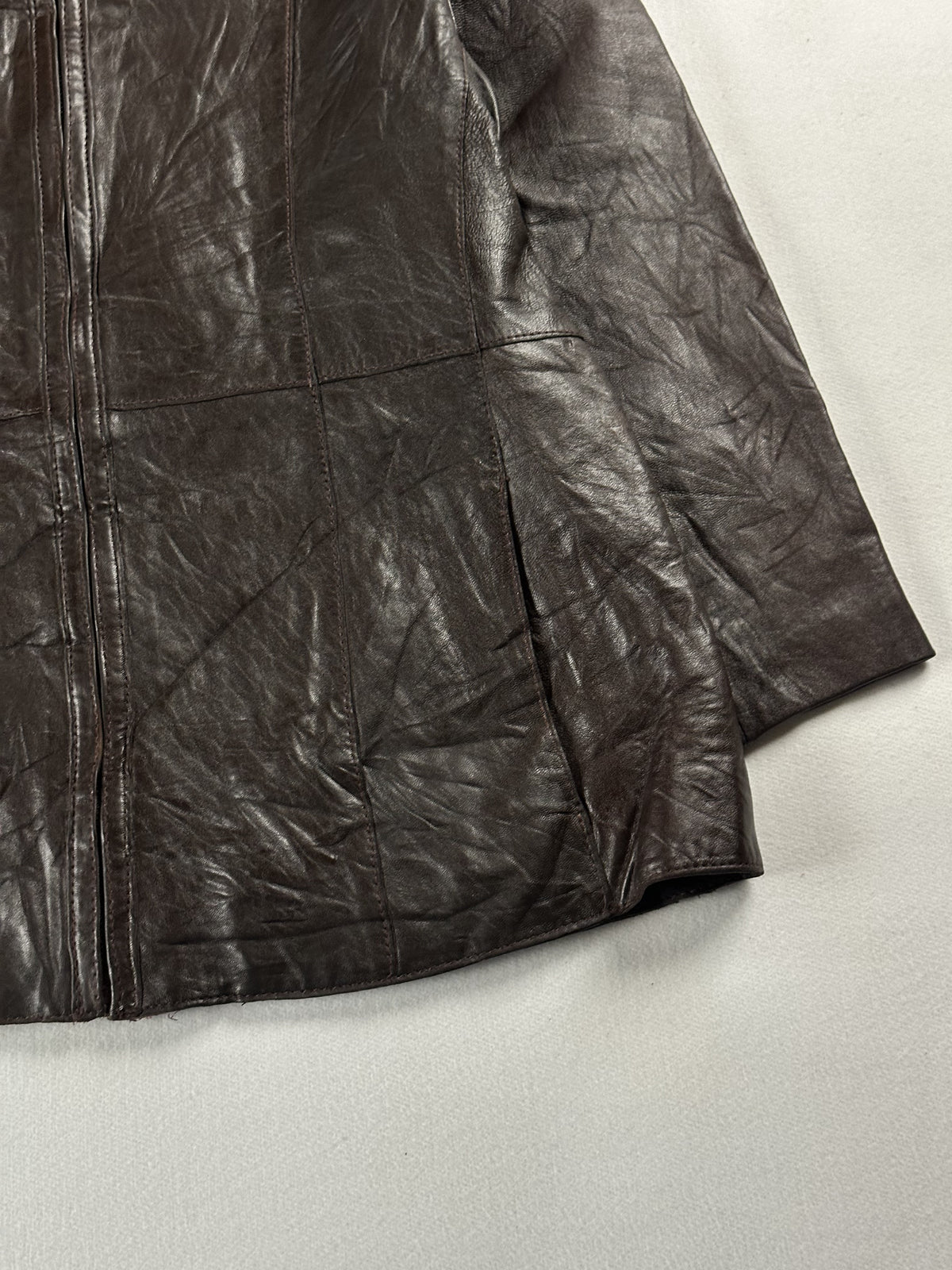 Brown leather jacket in very good condition, shown in size M