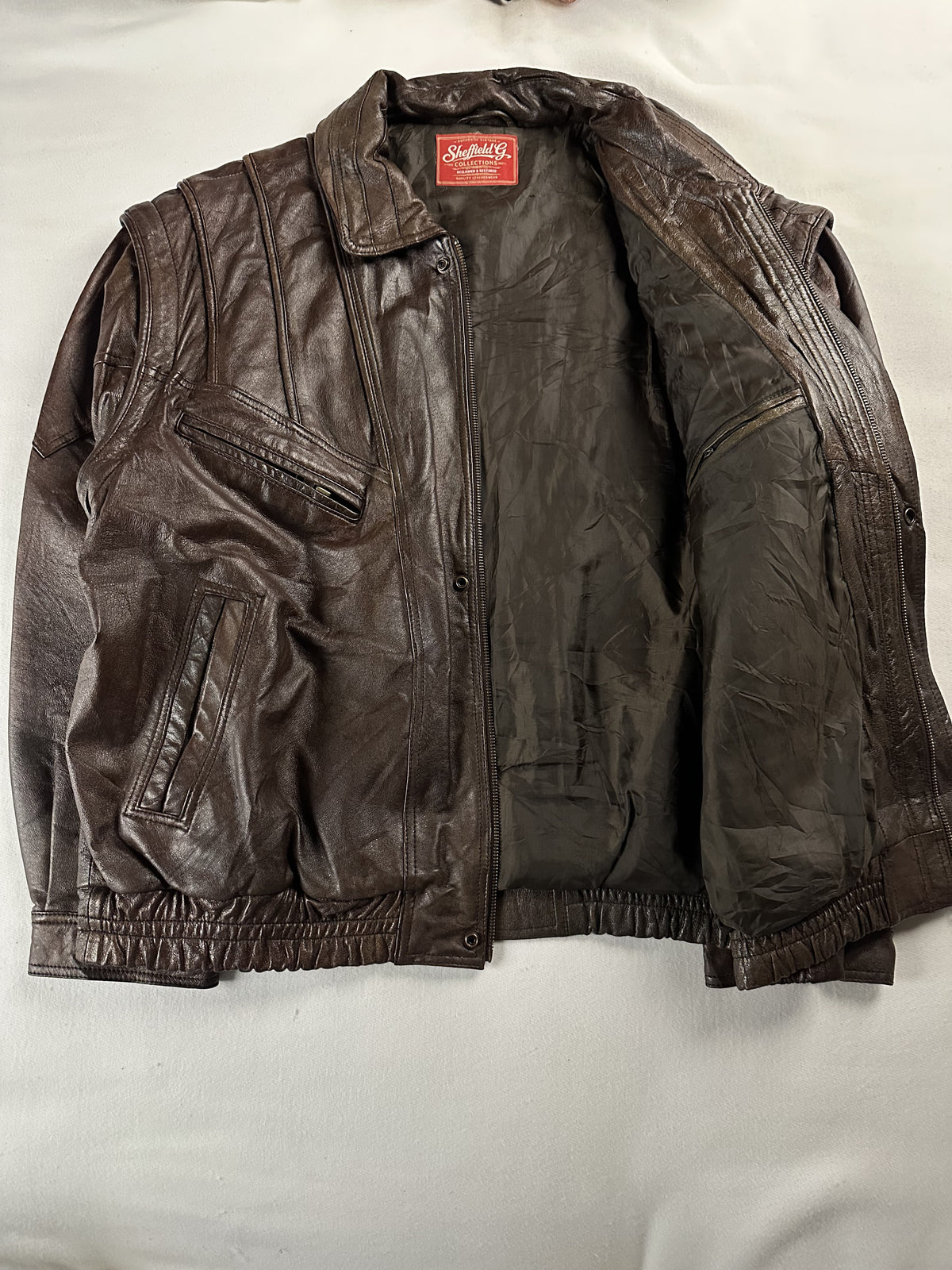 Brown Harrington opened out to show the full lining and the inner front edge
