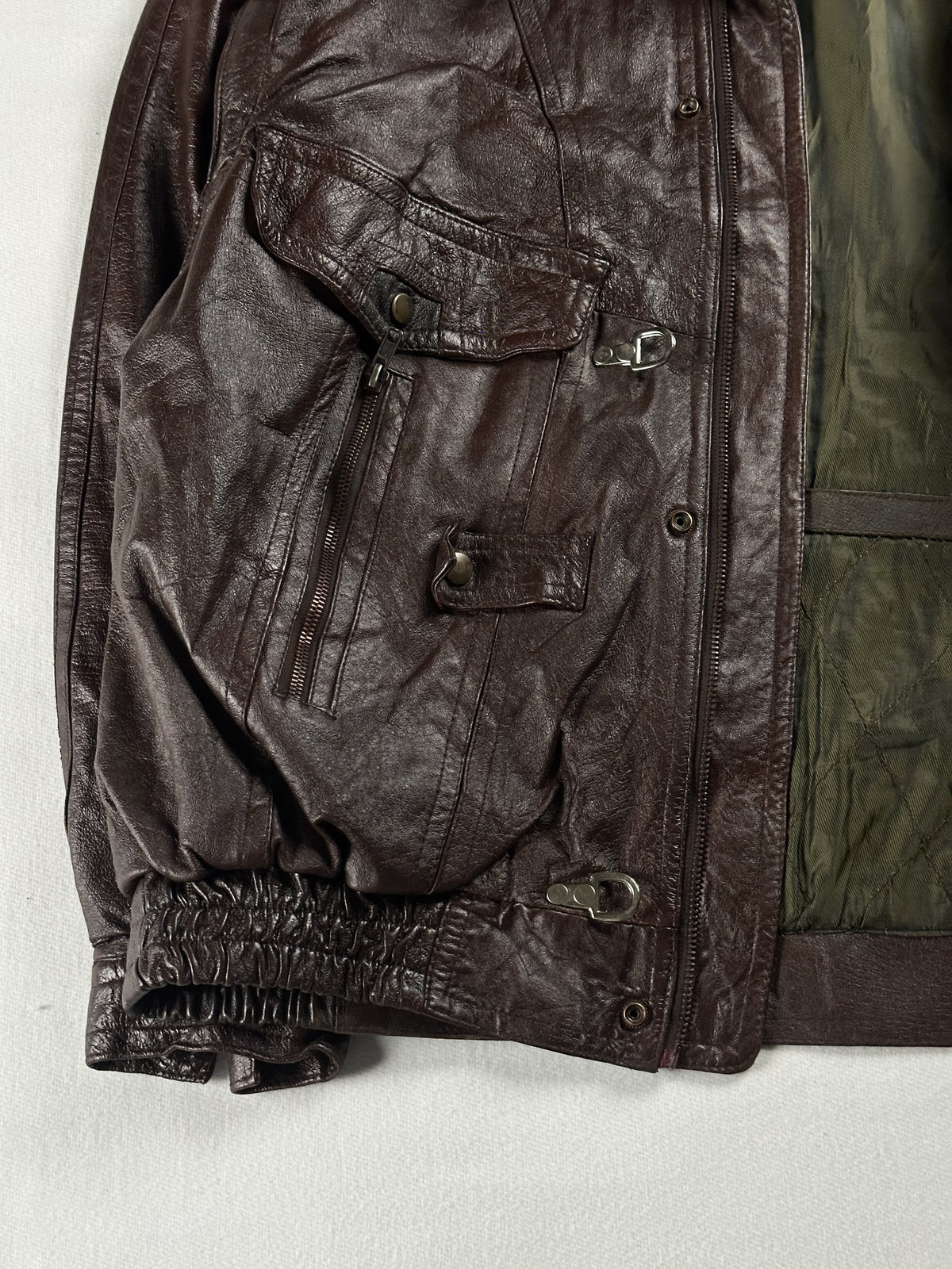 The size XL brown jacket, 25 inches long through the body