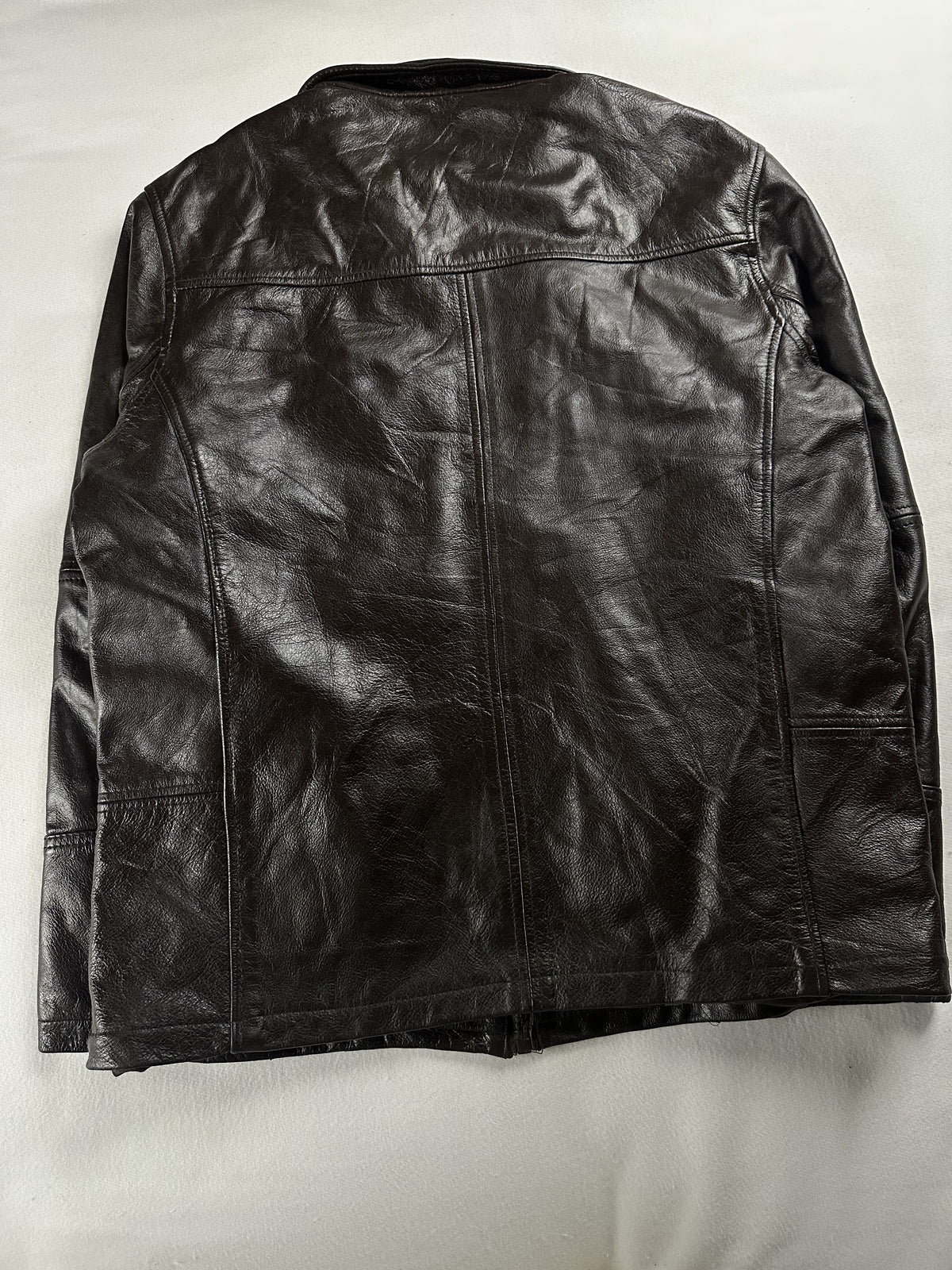 Brown leather cafe racer jacket in size L shown from the front