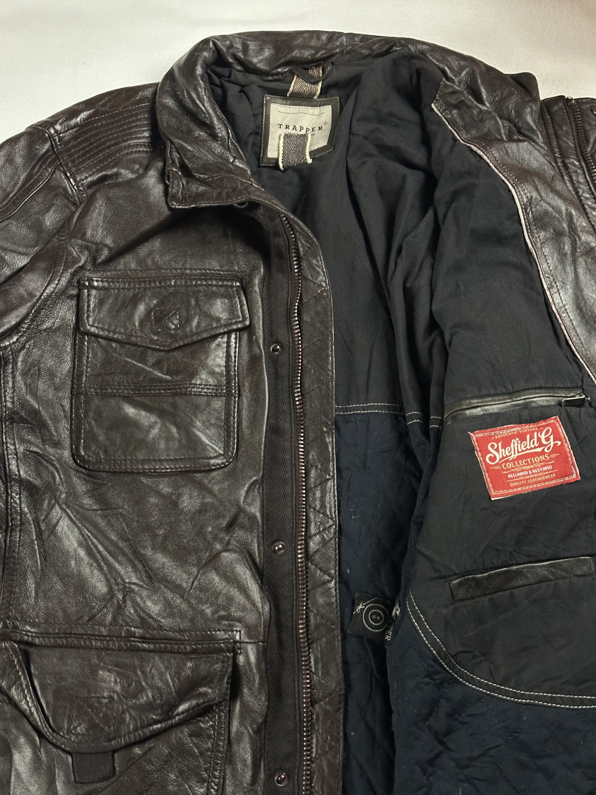 Brown real leather field jacket with a 24 inch sleeve, size XL