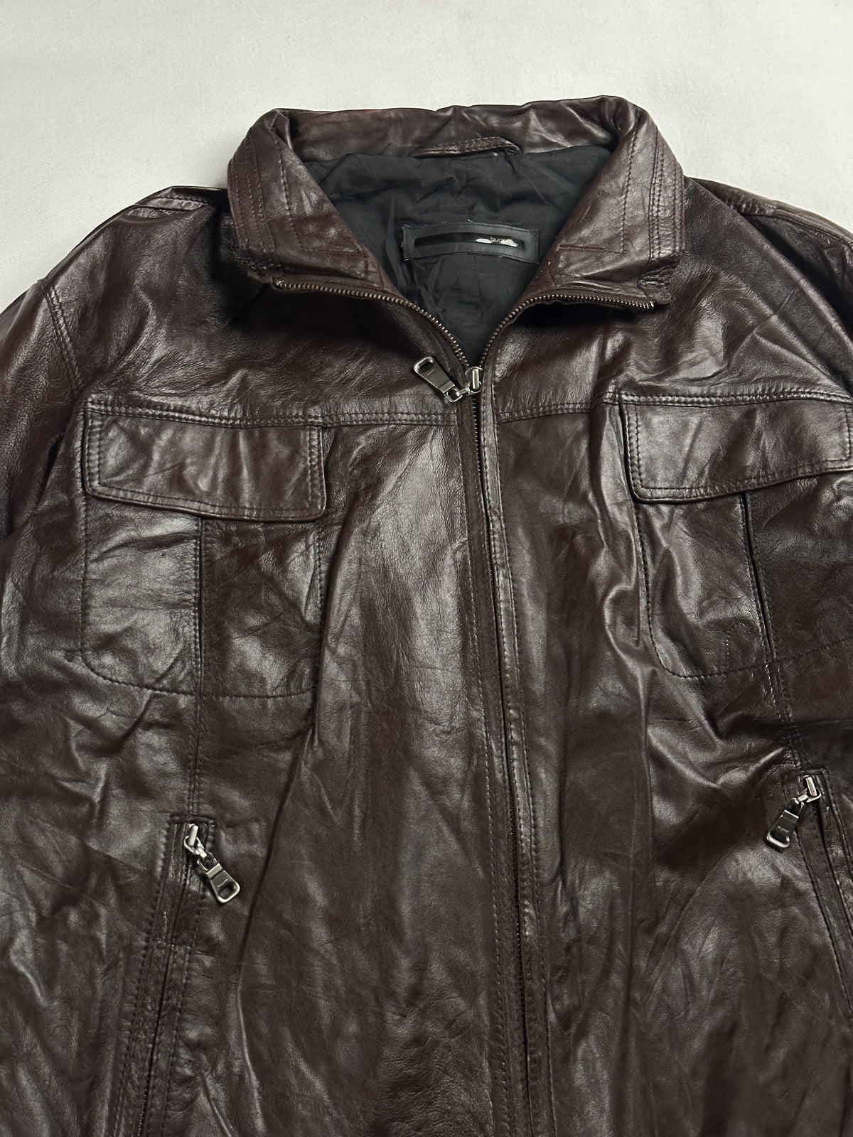 The size L brown cafe racer, 26 inches long through the body
