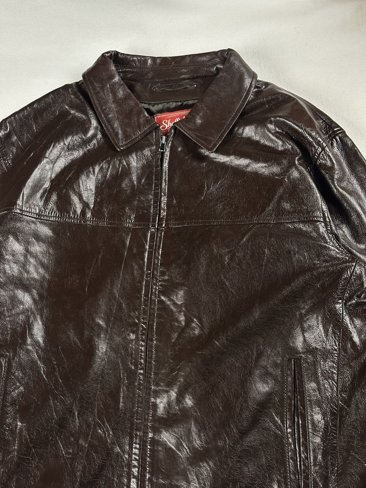 The size L brown jacket, 28 inches long through the body