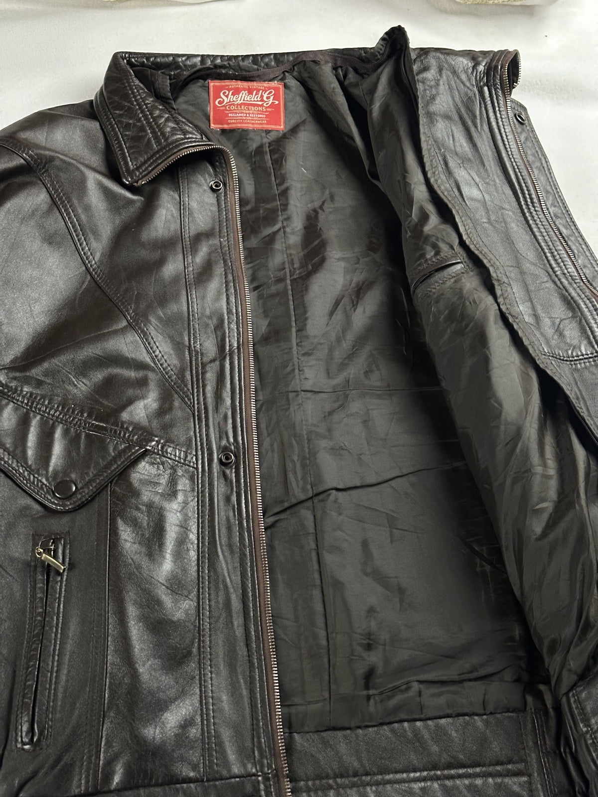 The long size XXL brown jacket, 30 inches through the body