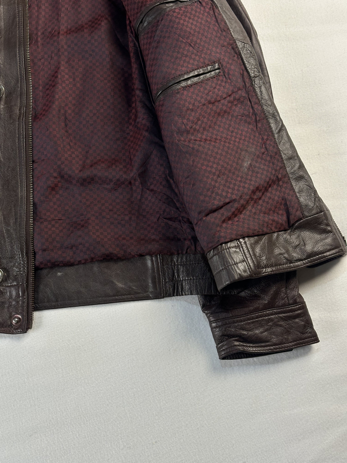 The size L brown jacket, 26 inches long through the body