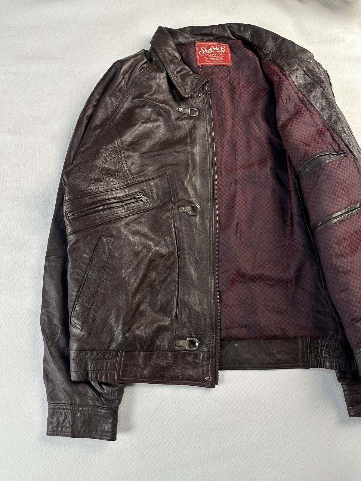 Brown real leather jacket with a 22 inch sleeve, size L